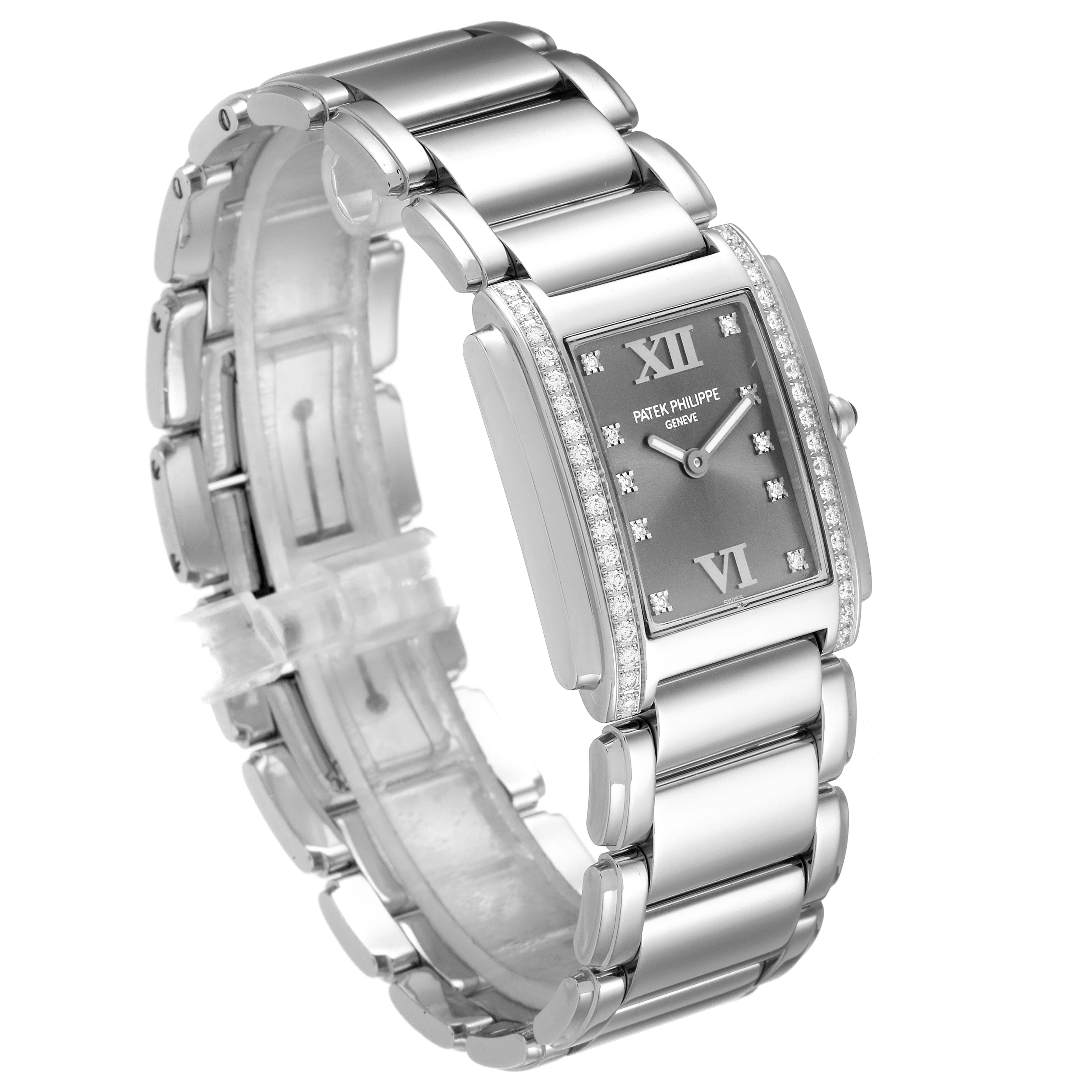 The image shows a side profile of a Patek Philippe Twenty-4 4910/10A-010 Women's Stainless Steel Grey Dial 4910/10A-010 Women's Stainless Steel Grey Dial watch, highlighting its case, bracelet, and dial.