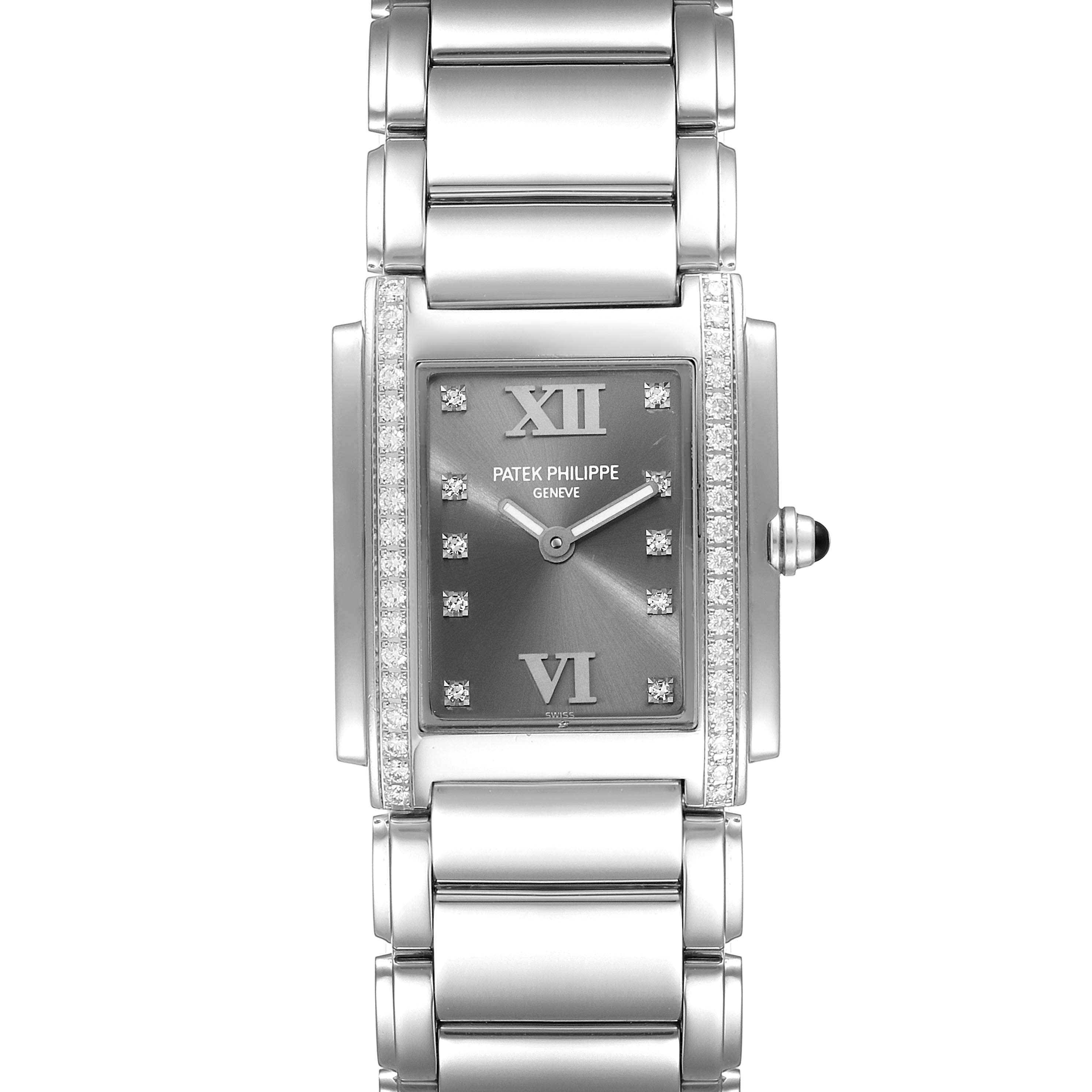 This image shows a front view of a Patek Philippe Twenty-4 4910/10A-010 Women's Stainless Steel Grey Dial 4910/10A-010 Women's Stainless Steel Grey Dial watch, highlighting the watch face and its metallic bracelet.