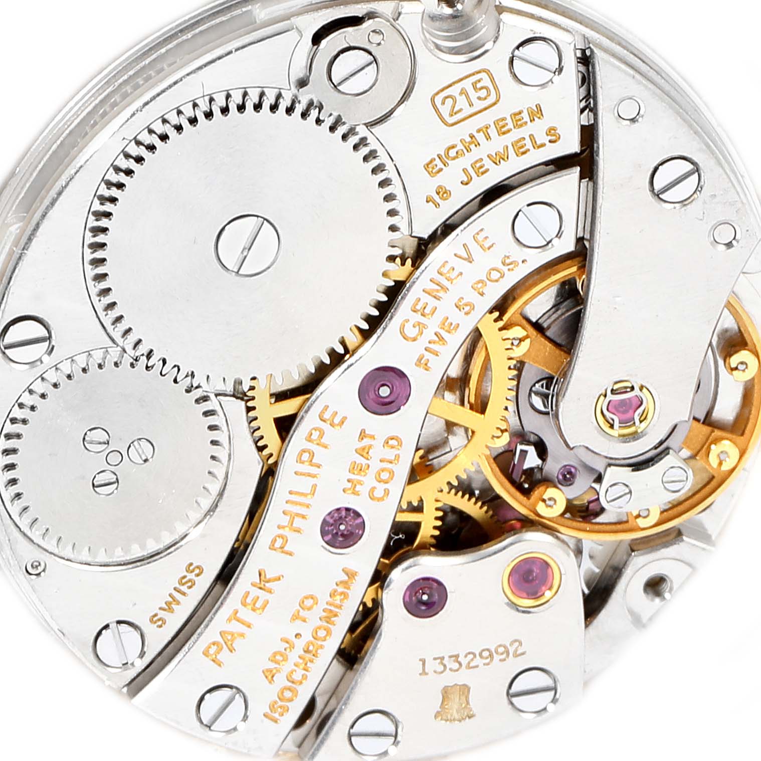 This image shows a close-up of the movement and internal gears of a vintage Patek Philippe watch.