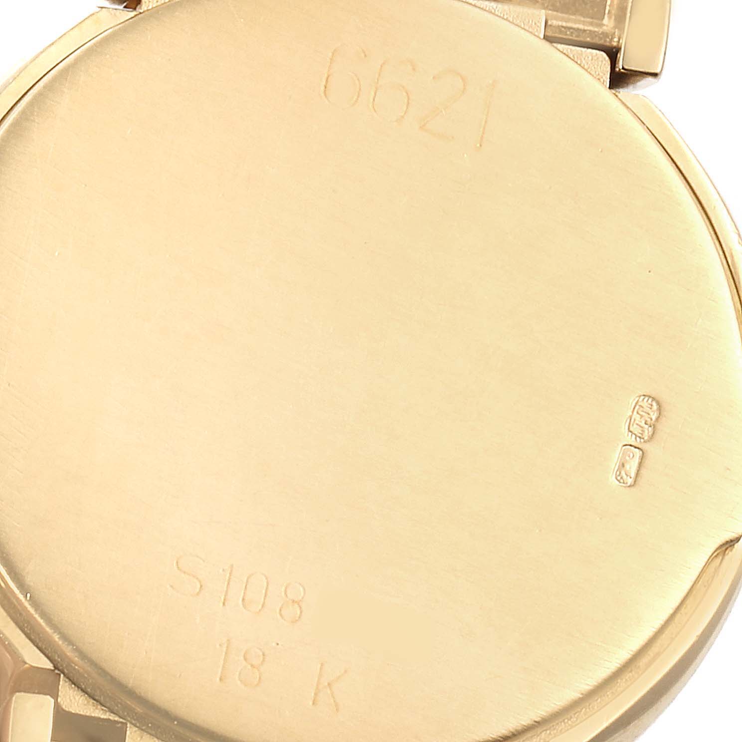 This image shows the back case of a Rolex Cellini 6621 Women's Yellow Gold Beige Dial 6621 Women's Yellow Gold Beige Dial watch, highlighting the engravings and material details.