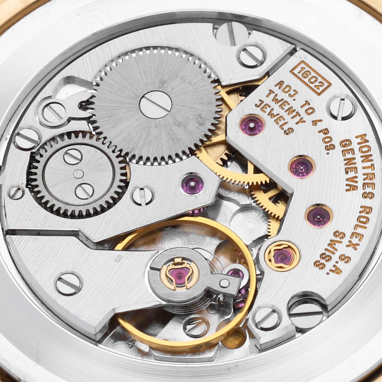 The image shows the movement mechanism of the Rolex Cellini 5112 Men's Yellow Gold White Dial 5112 Men's Yellow Gold White Dial model from a top view, displaying gears and jewel settings.