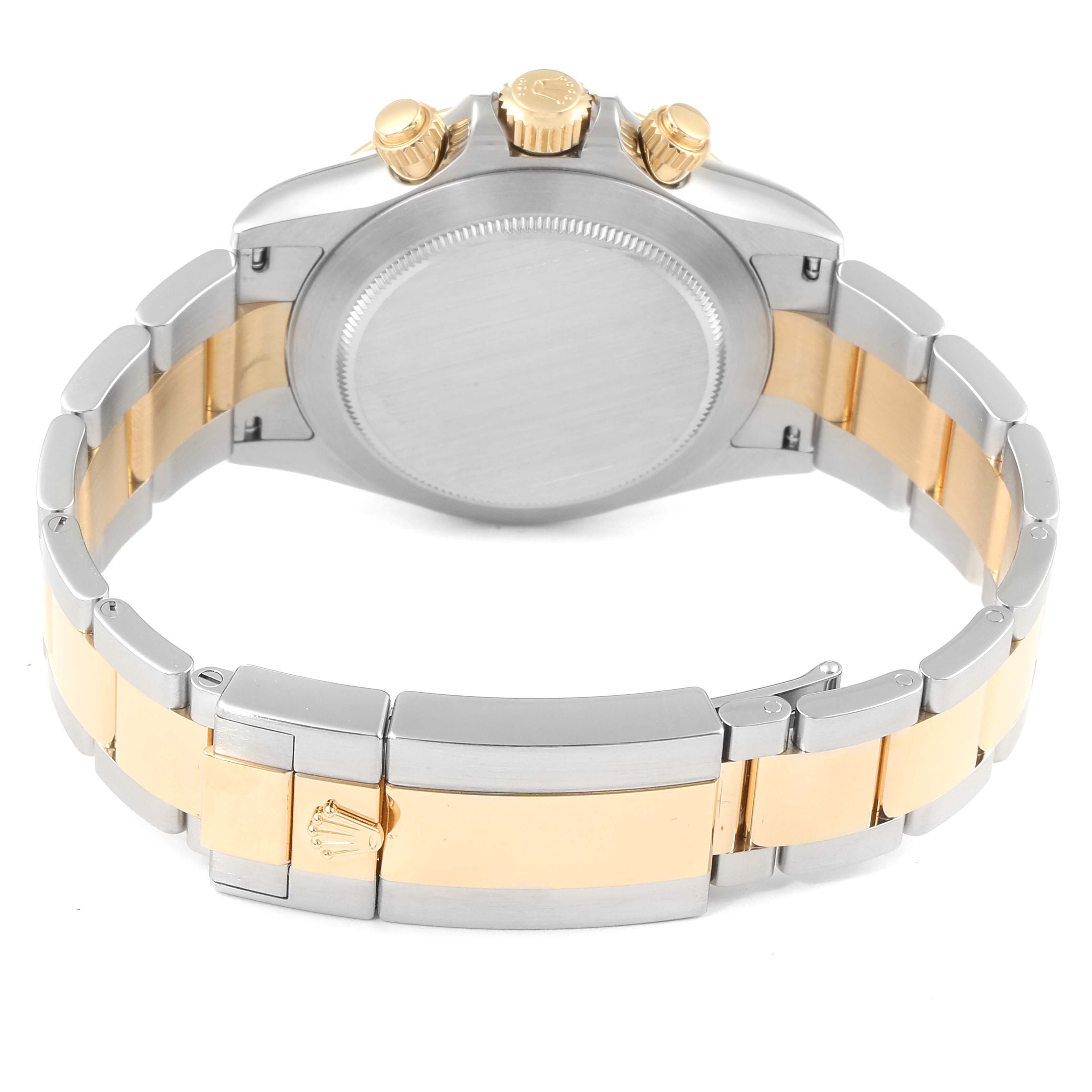 This image shows the back view of a Rolex Daytona 116503 Men's Steel and Gold (two tone) Champagne Dial 116503 Men's Steel and Gold (two tone) Champagne Dial watch, displaying the case back, crown, pushers, and two-tone bracelet.