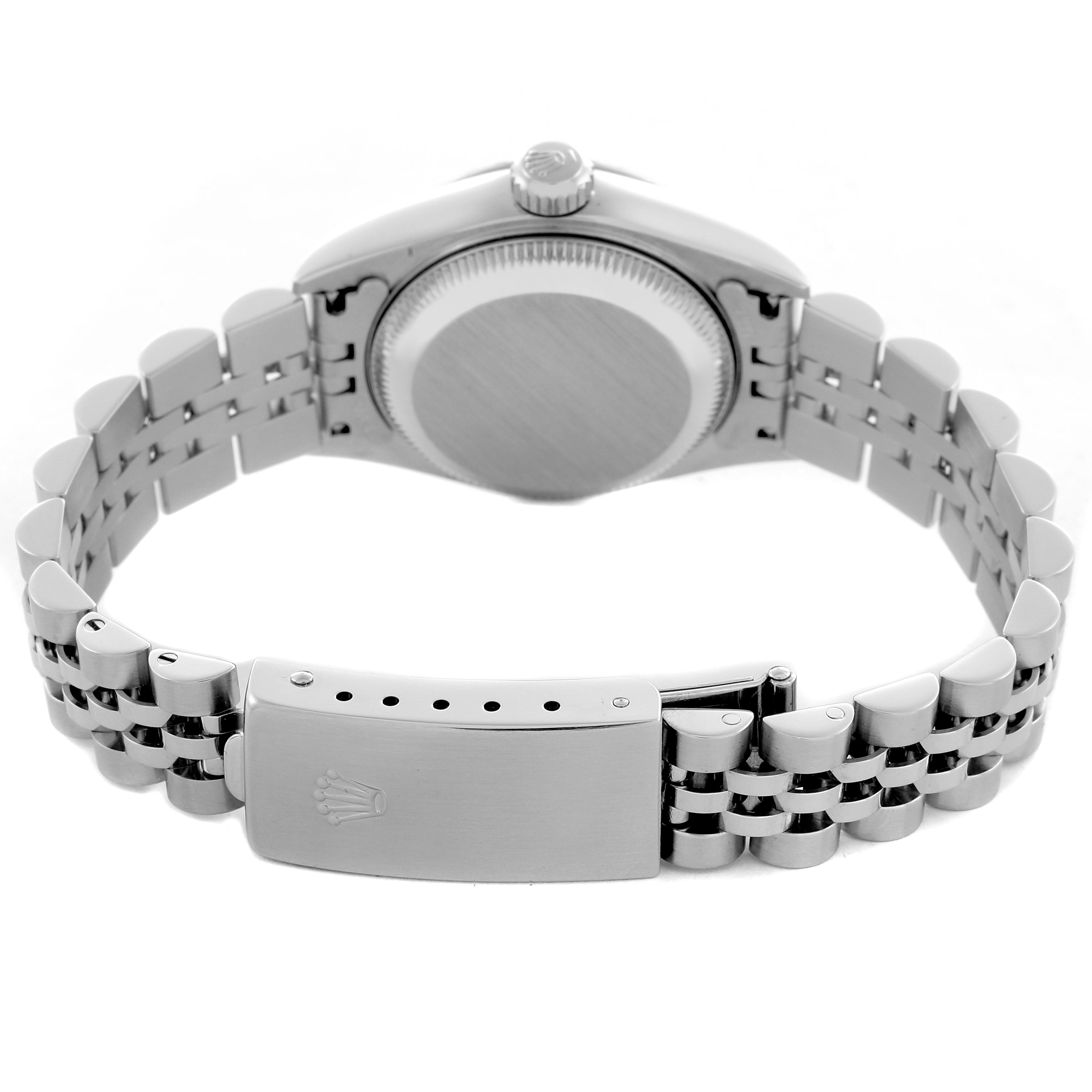 The image shows the back of a Rolex Date 79240 Women's Stainless Steel Pink Dial 79240 Women's Stainless Steel Pink Dial watch, highlighting the case back, crown, and Jubilee bracelet with a clasp.