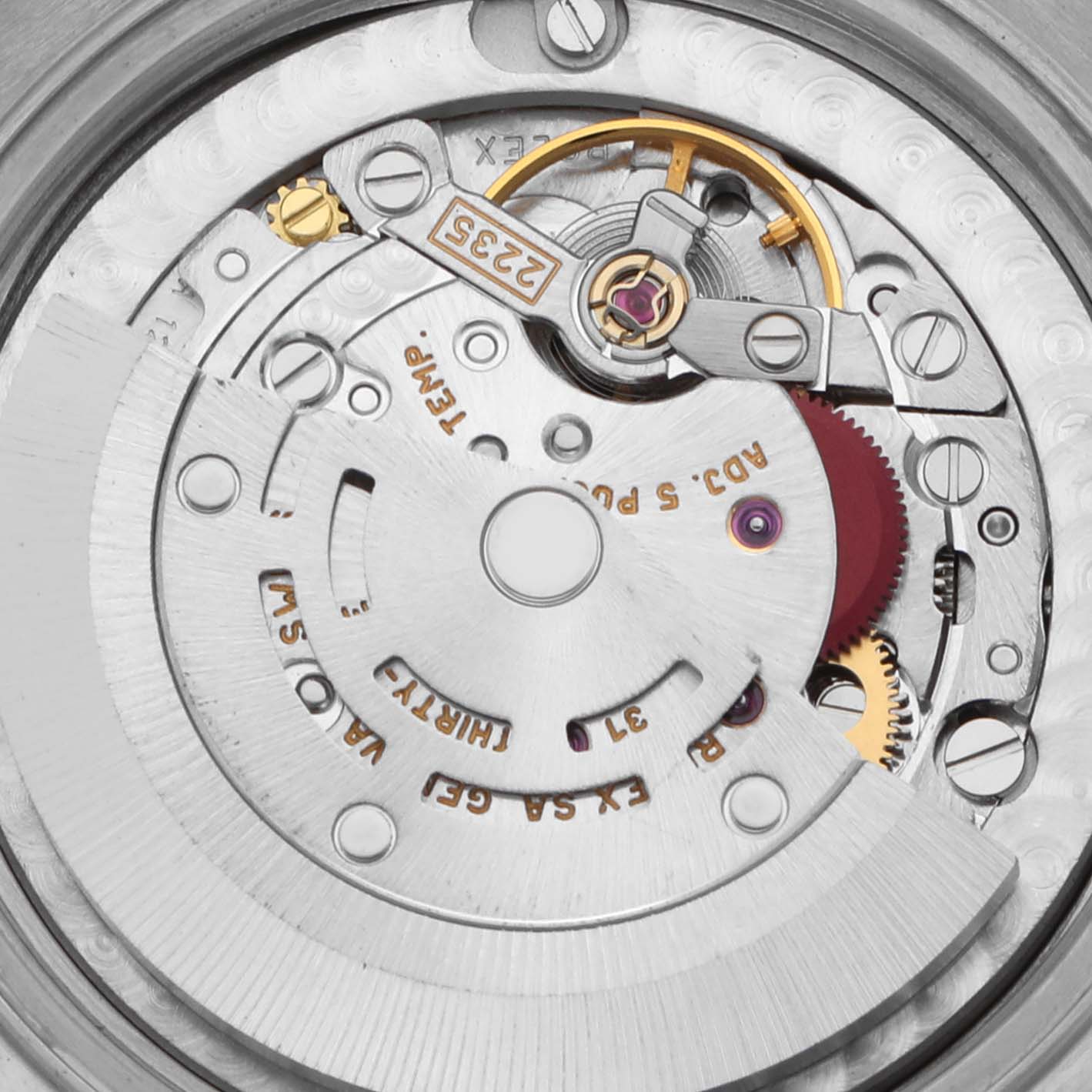 The image shows a close-up view of the movement mechanism of a Rolex Mid-Size 78274 Women's Stainless Steel Mother of Pearl Dial 78274 Women's Stainless Steel Mother of Pearl Dial model watch.