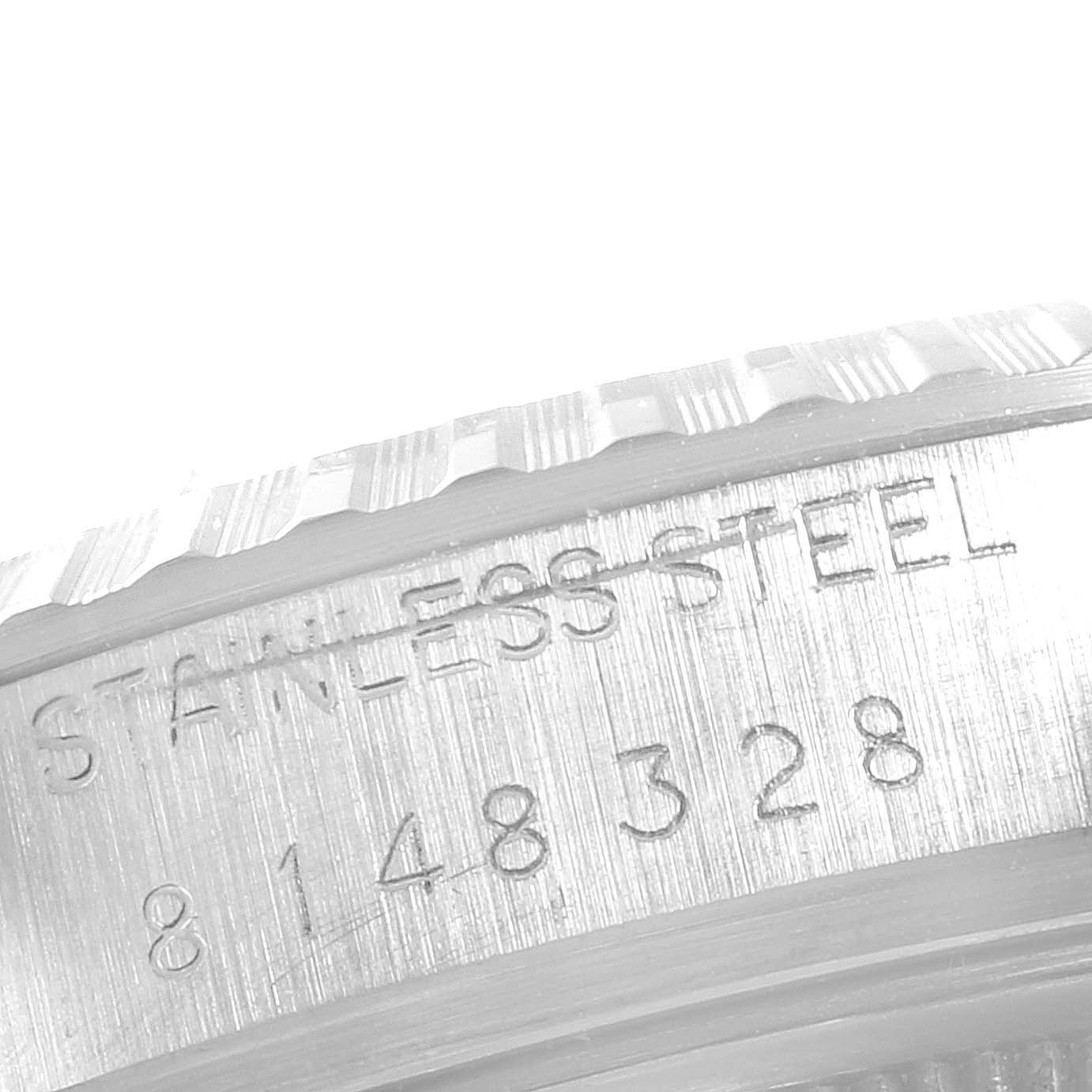 This close-up image shows the stainless steel case and model number of the Vintage Collection watch by Rolex.