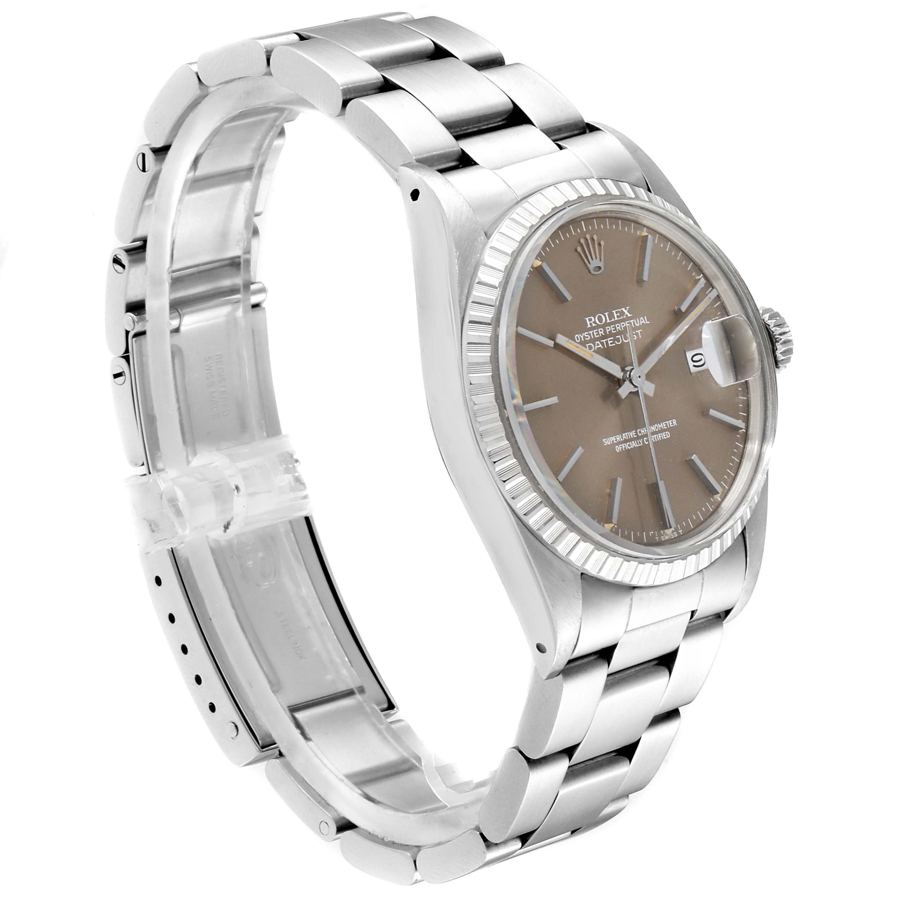 The image shows a side angle of a Vintage Collection Rolex watch displaying its face, crown, and metal band.