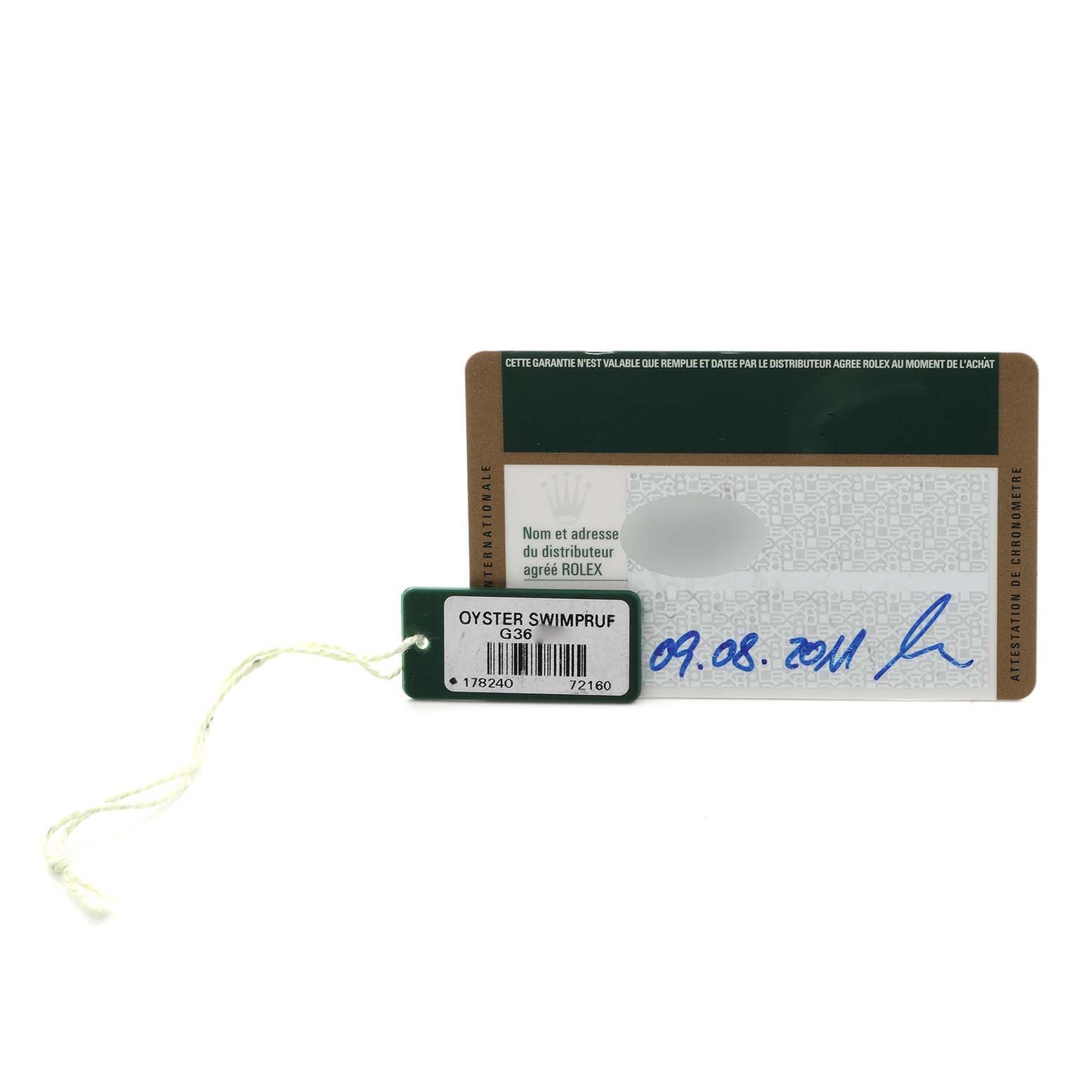 The image shows a Rolex Mid-Size 178240 Women's Stainless Steel Black Dial 178240 Women's Stainless Steel Black Dial warranty card and a green "Oyster Swimpruf" tag.