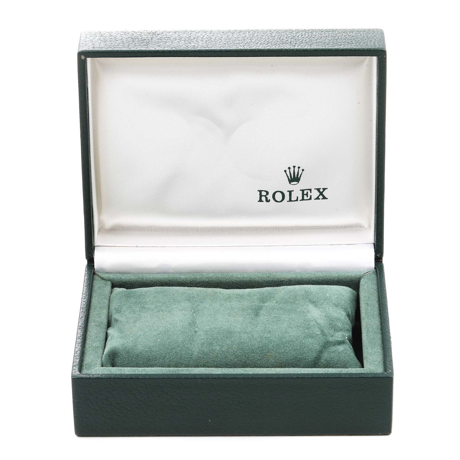 The image shows an open green Rolex watch box for the Mid-Size model, displaying the interior with the Rolex logo.