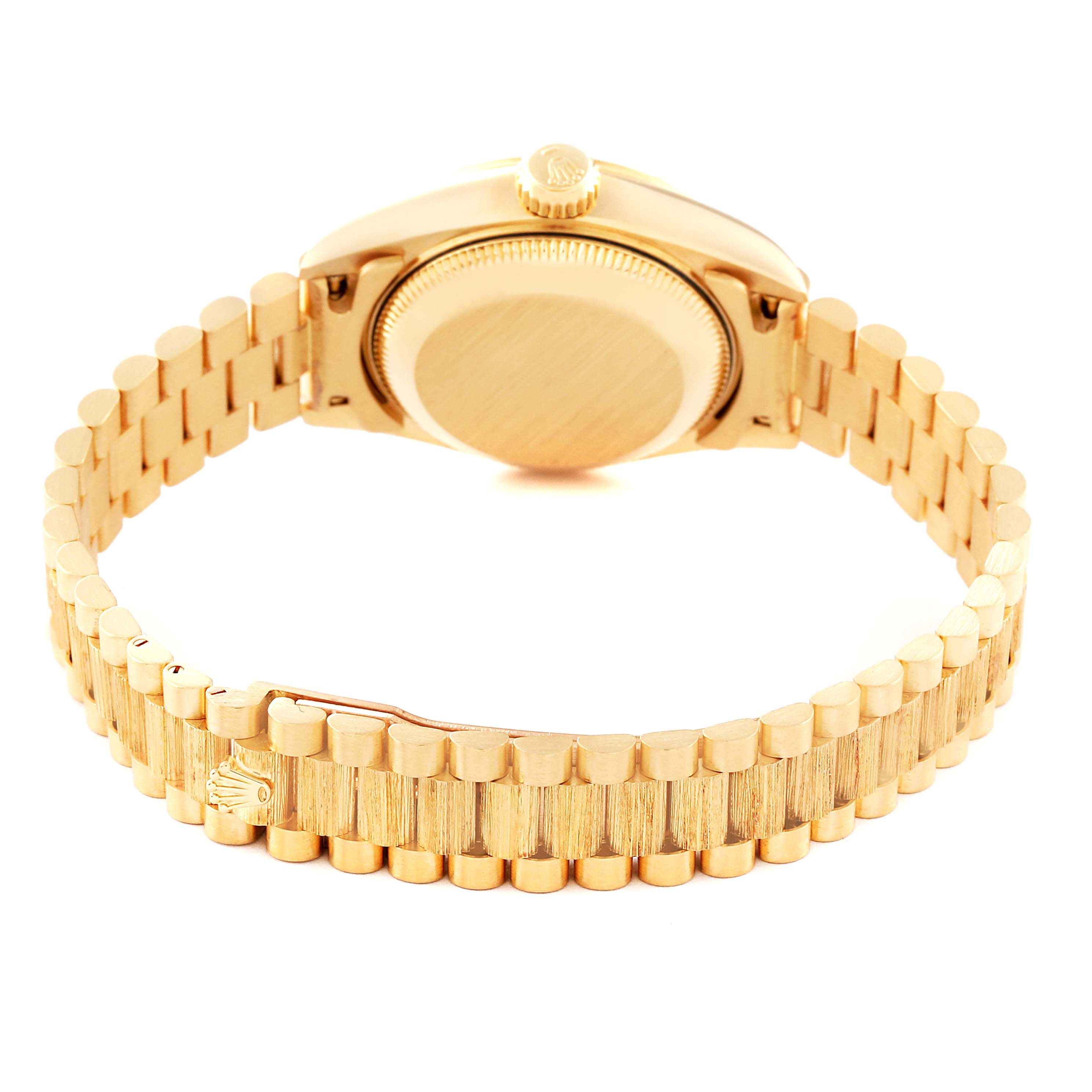 The image shows the backside of a Rolex President 69278 Women's Yellow Gold Champagne Dial 69278 Women's Yellow Gold Champagne Dial model watch, highlighting the bracelet and case back.