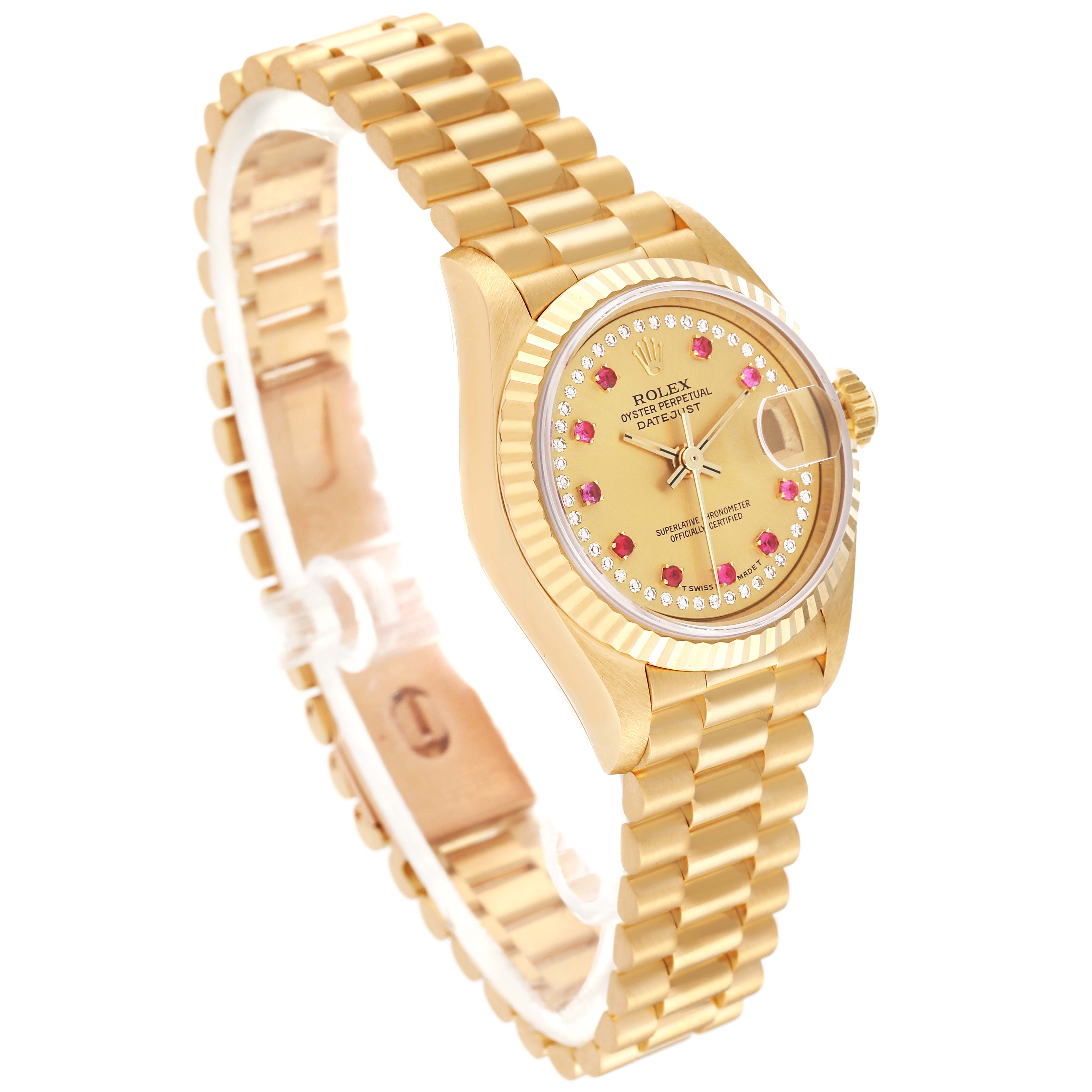 The Rolex President 69178 Women
s Yellow Gold Champagne Dial 69178 Women
s Yellow Gold Champagne Dial model watch is shown at a slight angle, highlighting its gold case, fluted bezel, linked bracelet, and ruby-studded dial.