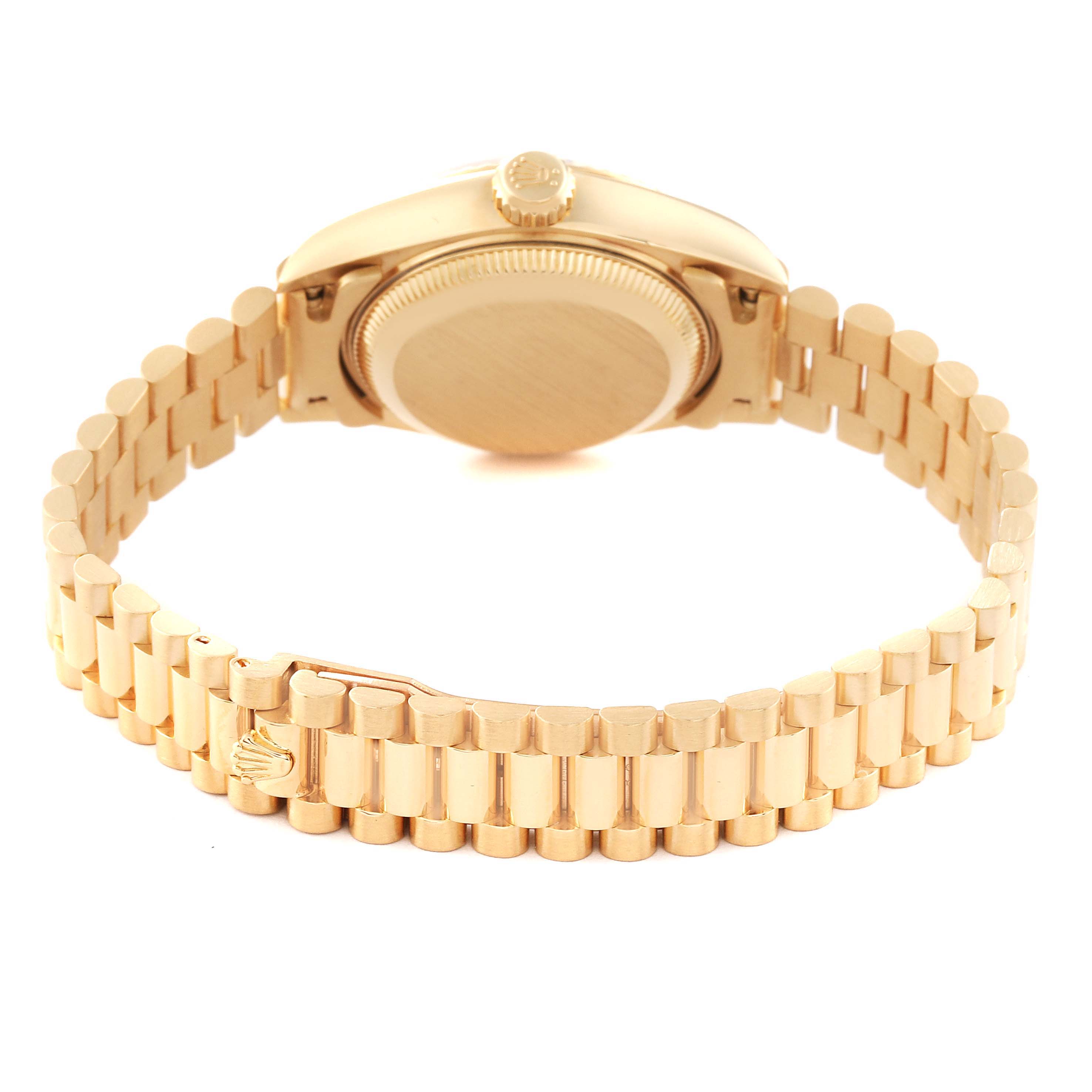 The image shows the backside of a Rolex President 69178 Women
s Yellow Gold Champagne Dial 69178 Women
s Yellow Gold Champagne Dial model watch, highlighting the bracelet and the case back.