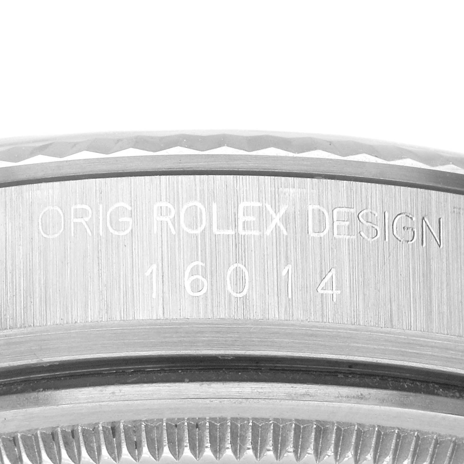 This image shows a close-up of the side engraving on a Rolex Vintage Collection 16014 Men's Stainless Steel Silver Dial 16014 Men's Stainless Steel Silver Dial model 16014.