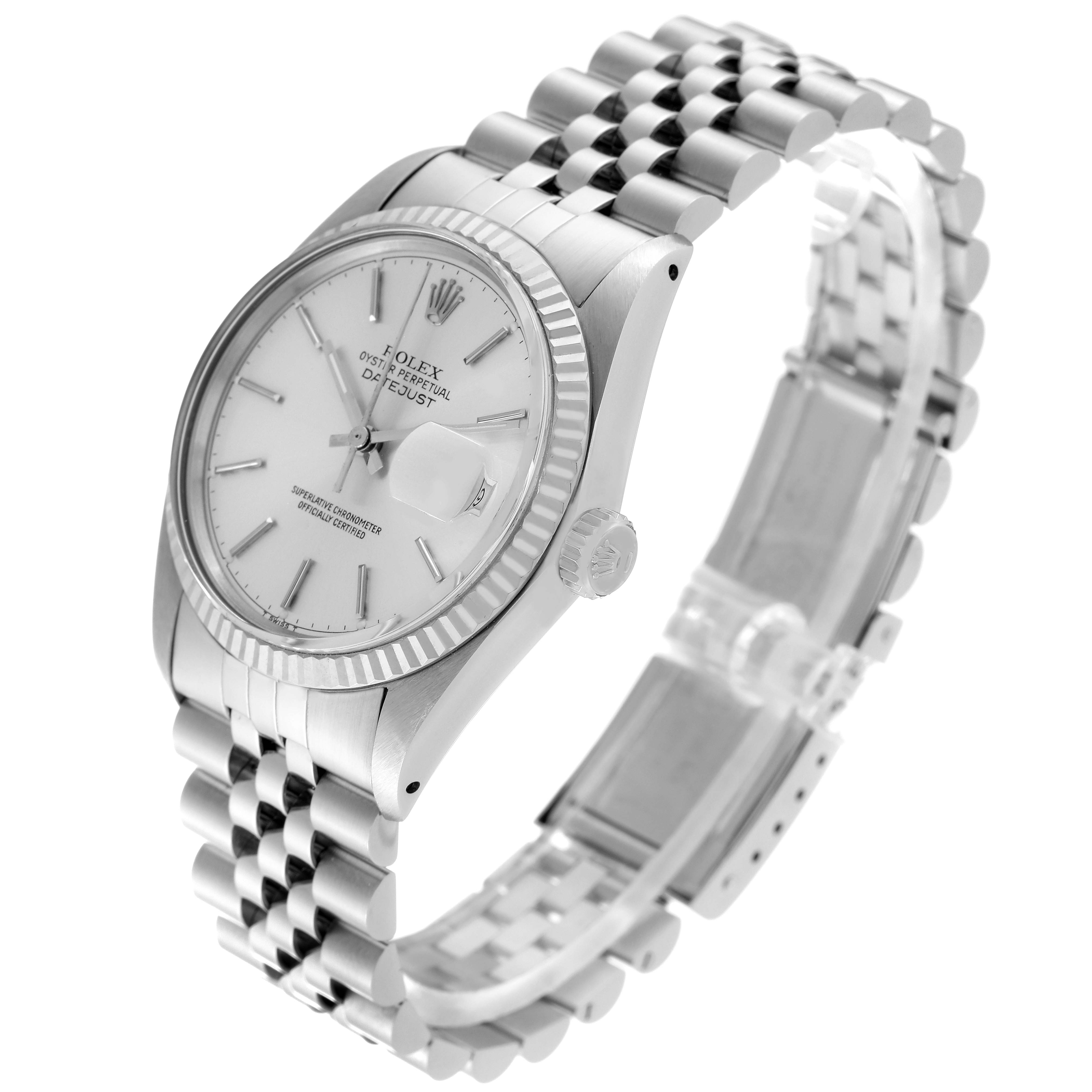 The Vintage Collection Rolex watch is shown at an oblique angle, displaying the face, bezel, crown, and bracelet.