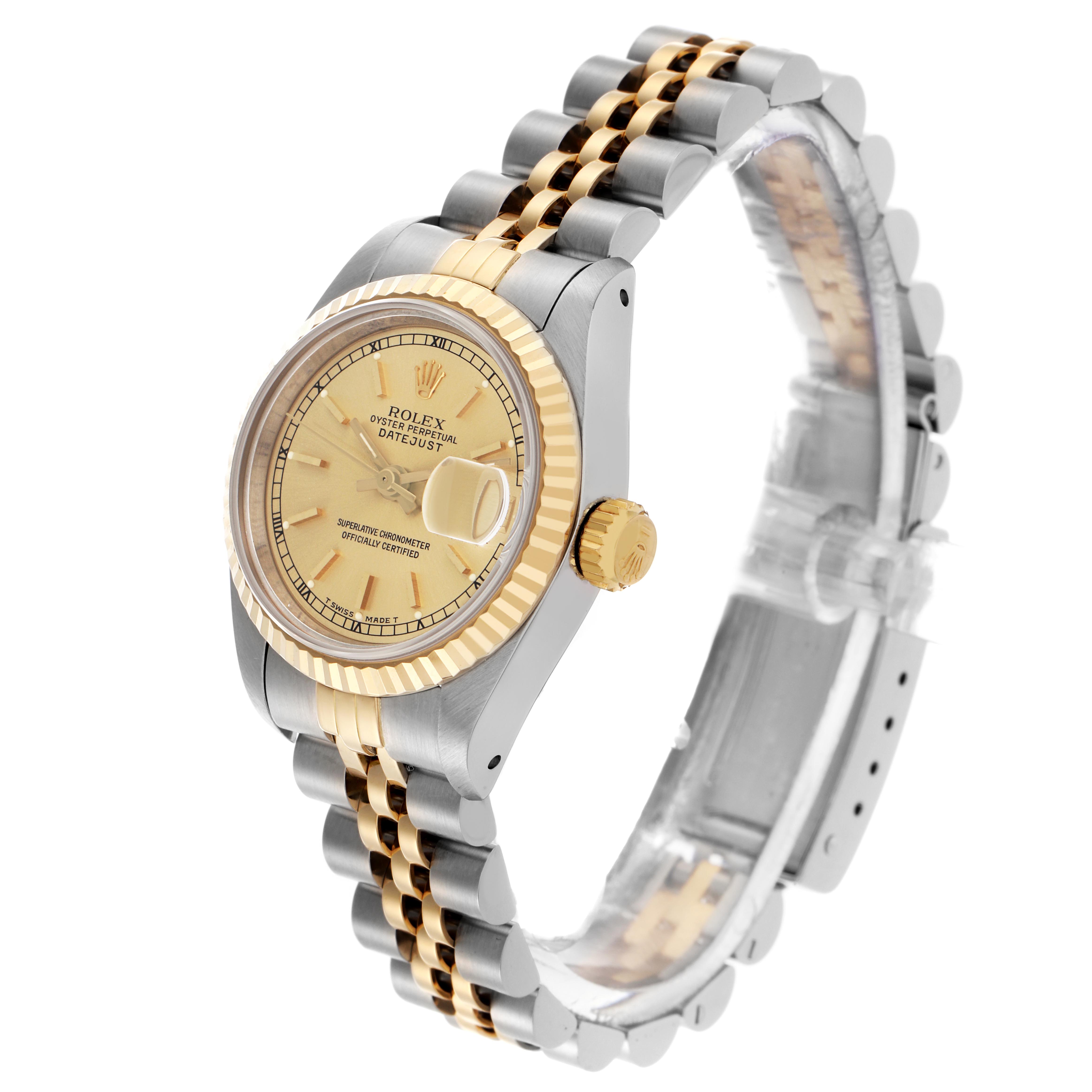 The Rolex Datejust 69173 Women's Steel and Gold (two tone) Champagne Dial 69173 Women's Steel and Gold (two tone) Champagne Dial watch is shown at a three-quarter angle, highlighting the dial, bezel, crown, and two-tone bracelet.