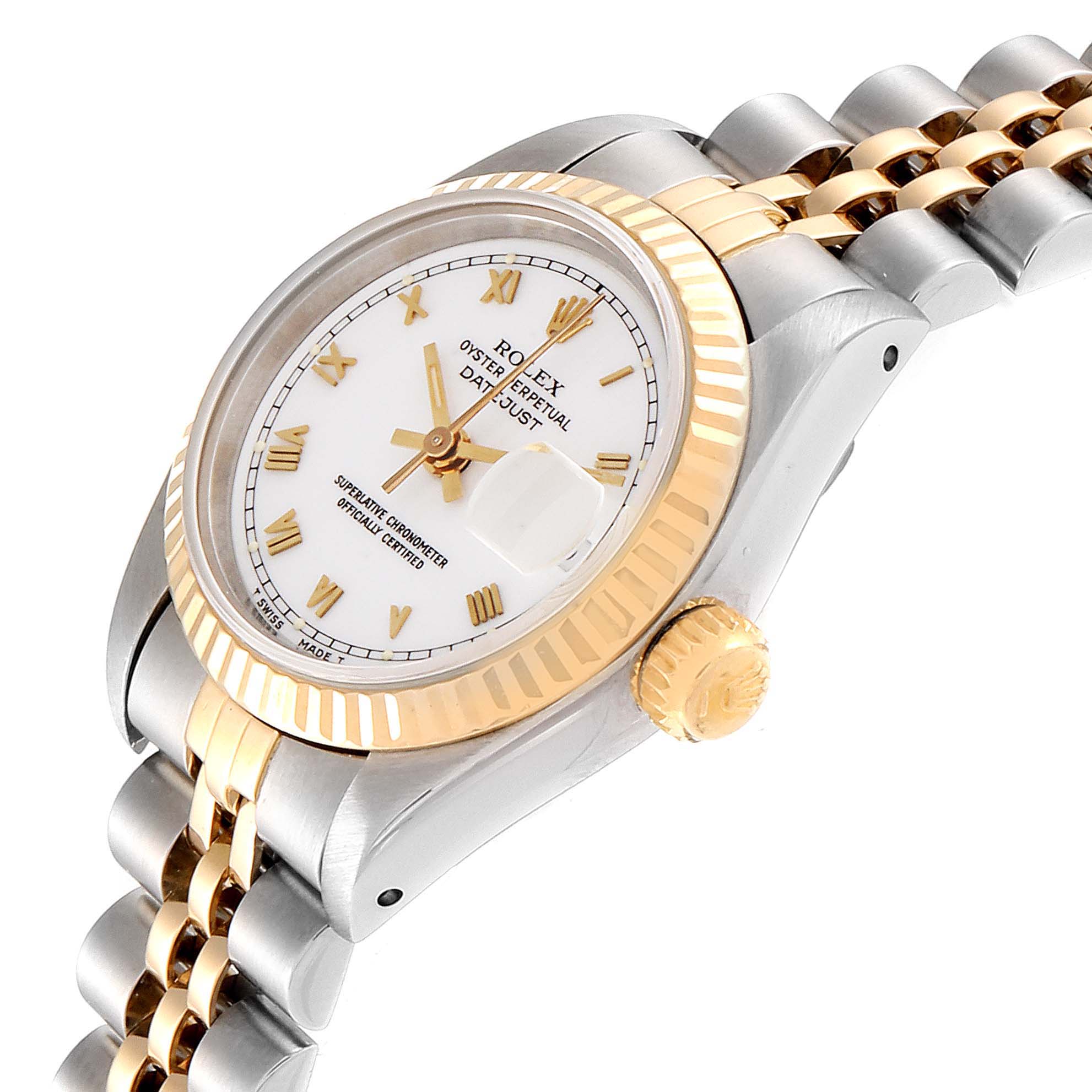 This image shows a side angle of a Rolex Datejust 69173 Women
s Steel and Gold (two tone) White Dial 69173 Women
s Steel and Gold (two tone) White Dial watch, highlighting its dial, bezel, and crown.