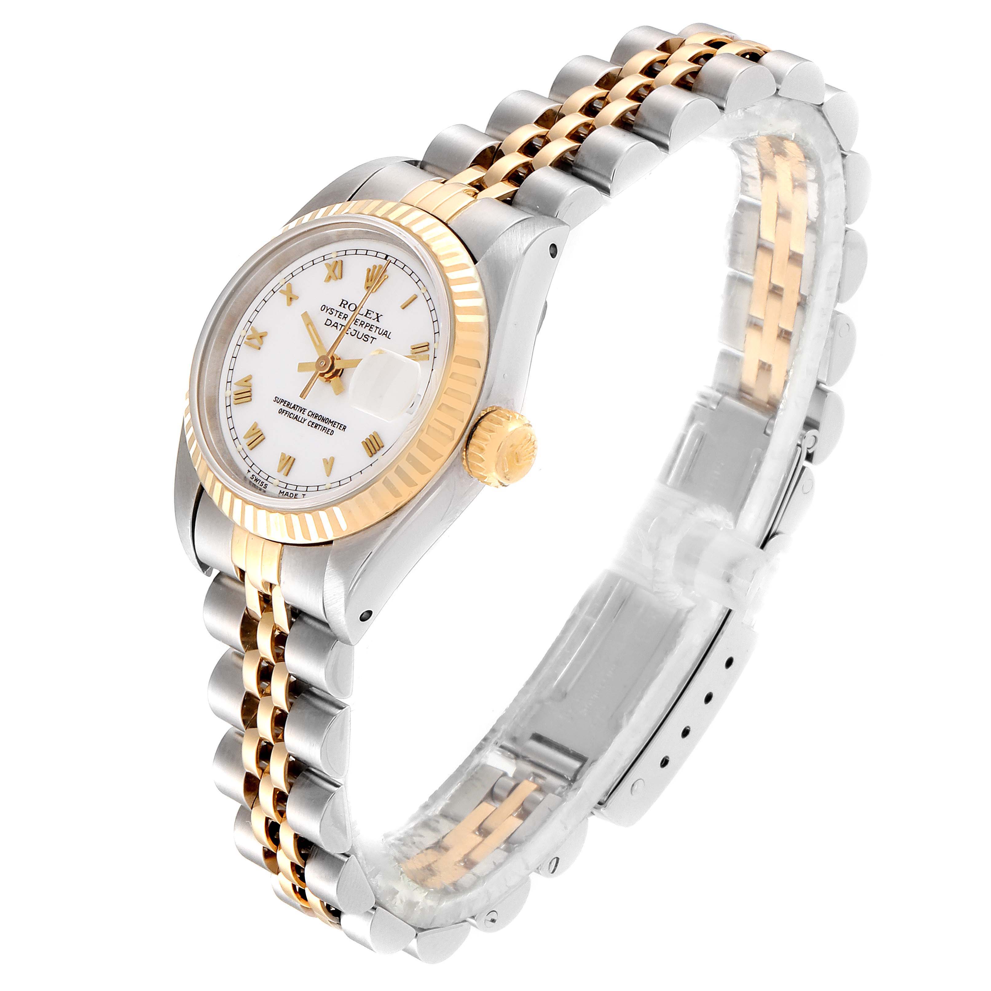 The image shows the Rolex Datejust 69173 Women
s Steel and Gold (two tone) White Dial 69173 Women
s Steel and Gold (two tone) White Dial model from an angle highlighting the bezel, dial, bracelet, and crown.