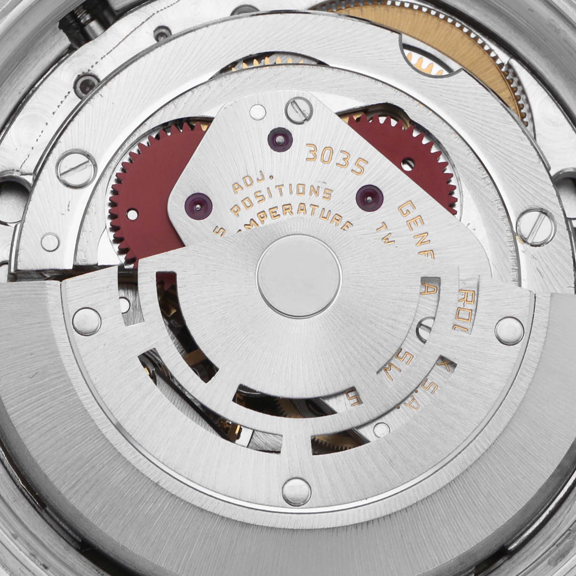 The image shows a close-up of the movement mechanism of a Rolex Datejust 16013 Men's Steel and Gold (two tone) Champagne Dial 16013 Men's Steel and Gold (two tone) Champagne Dial watch, highlighting gears and the automatic rotor.