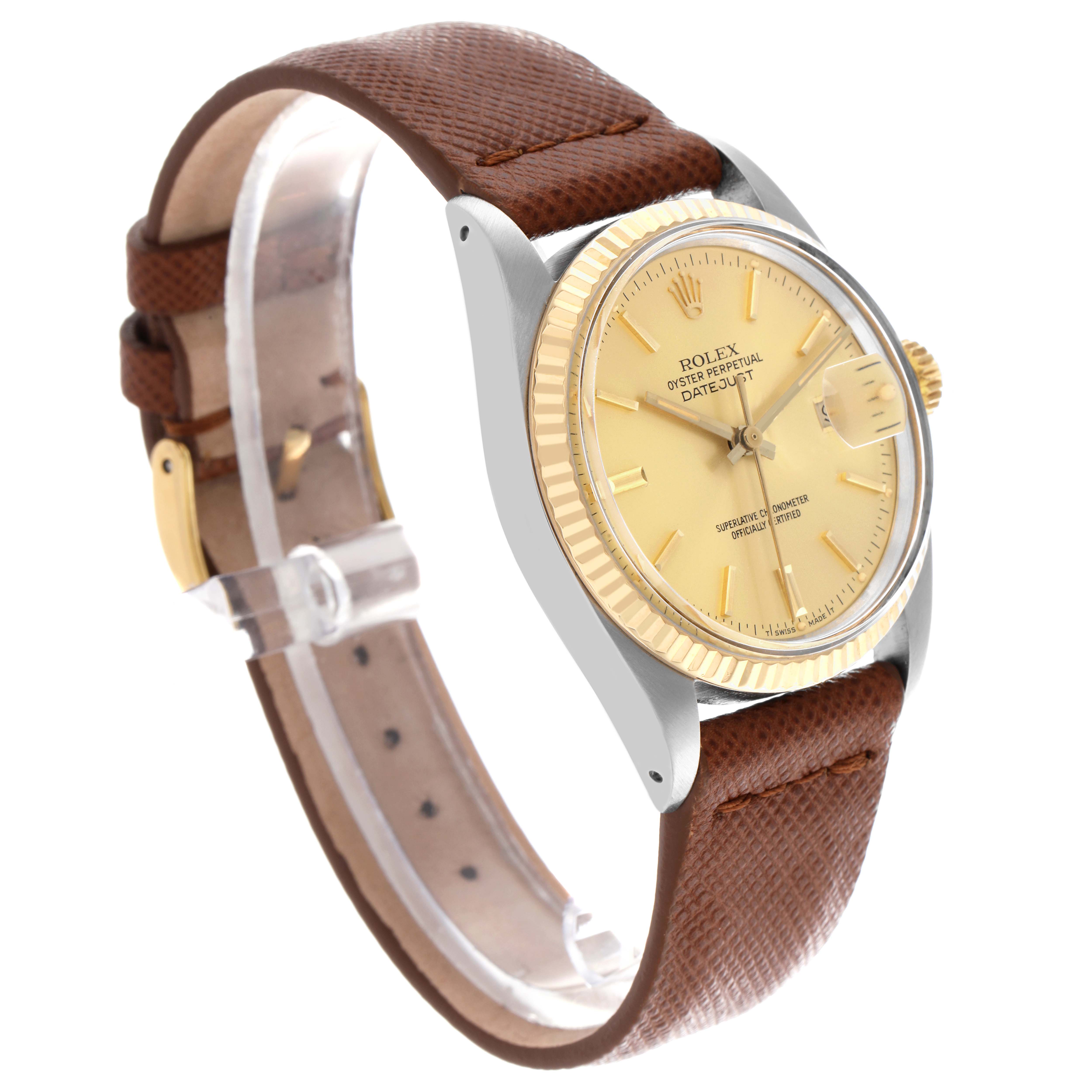 The Rolex Datejust 16013 Men's Steel and Gold (two tone) Champagne Dial 16013 Men's Steel and Gold (two tone) Champagne Dial watch is shown at a slight angle, highlighting the gold dial, fluted bezel, and brown leather strap.
