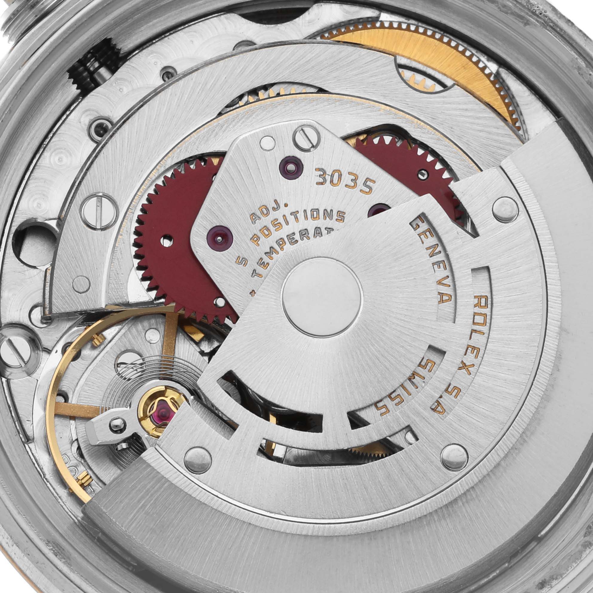 The image shows a close-up view of the movement inside a Rolex Datejust 16013 Men's Steel and Gold (two tone) Champagne Dial 16013 Men's Steel and Gold (two tone) Champagne Dial, focusing on gears and the rotor.