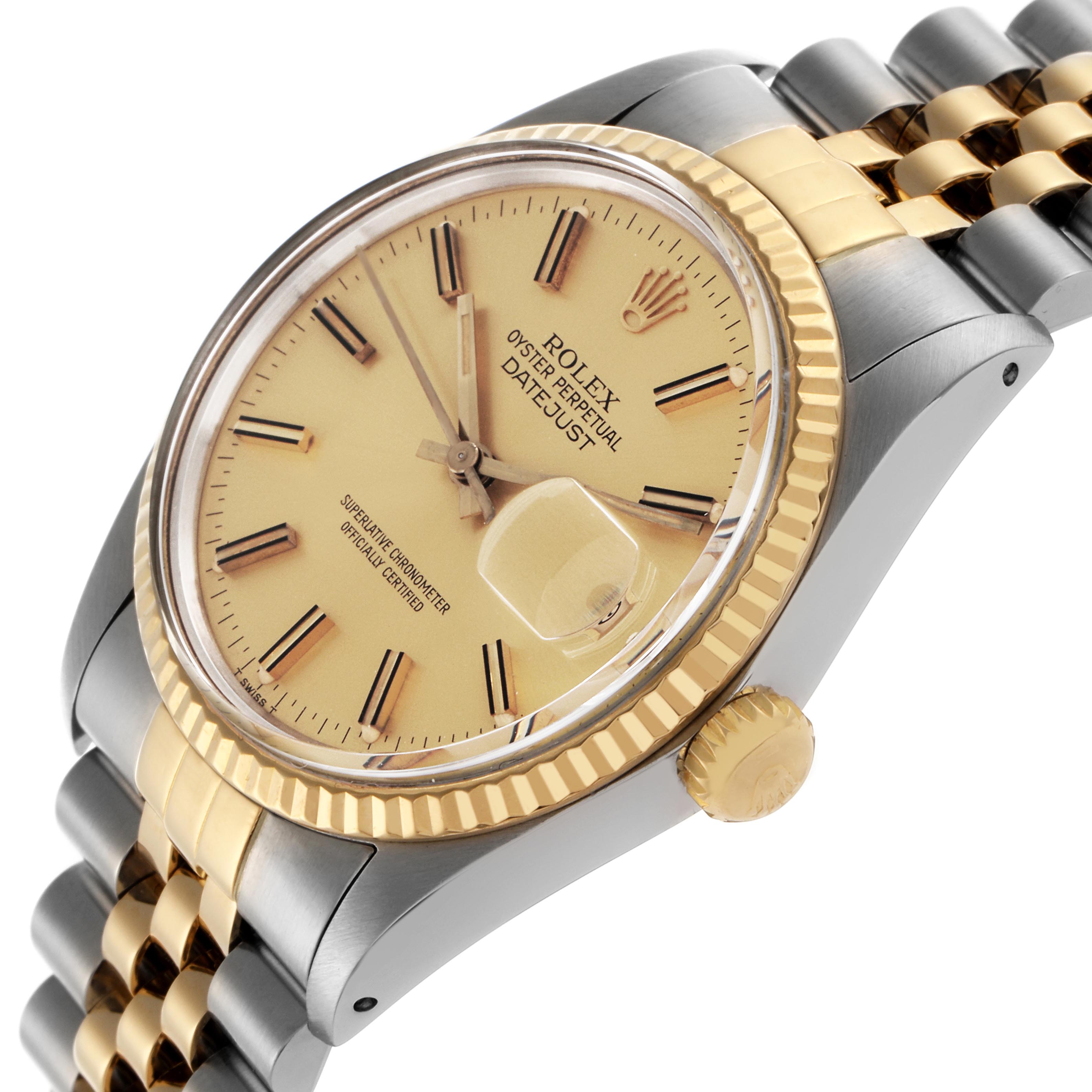 The Rolex Datejust 16013 Men's Steel and Gold (two tone) Champagne Dial 16013 Men's Steel and Gold (two tone) Champagne Dial watch is shown at a slight angle highlighting the dial, bezel, crown, and part of the bracelet.