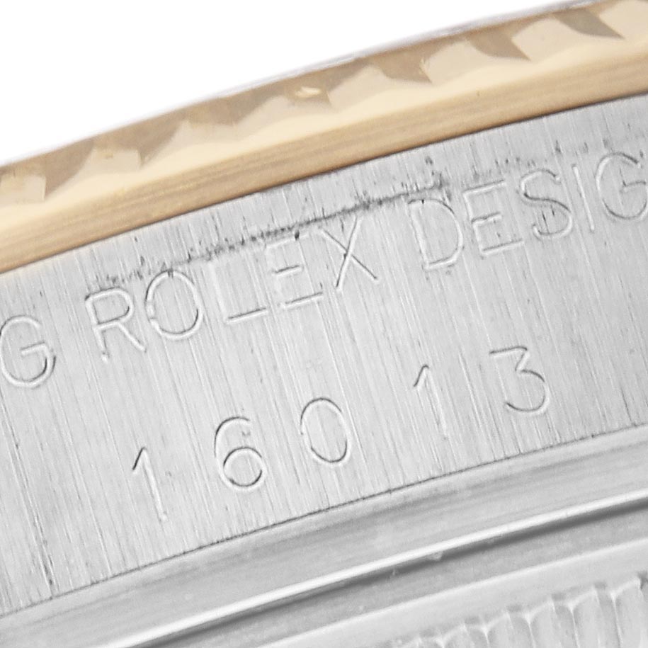 The image shows a close-up of the case engravings on a Rolex Datejust 16013 Men's Steel and Gold (two tone) Champagne Dial 16013 Men's Steel and Gold (two tone) Champagne Dial watch, displaying part of the model number and text.