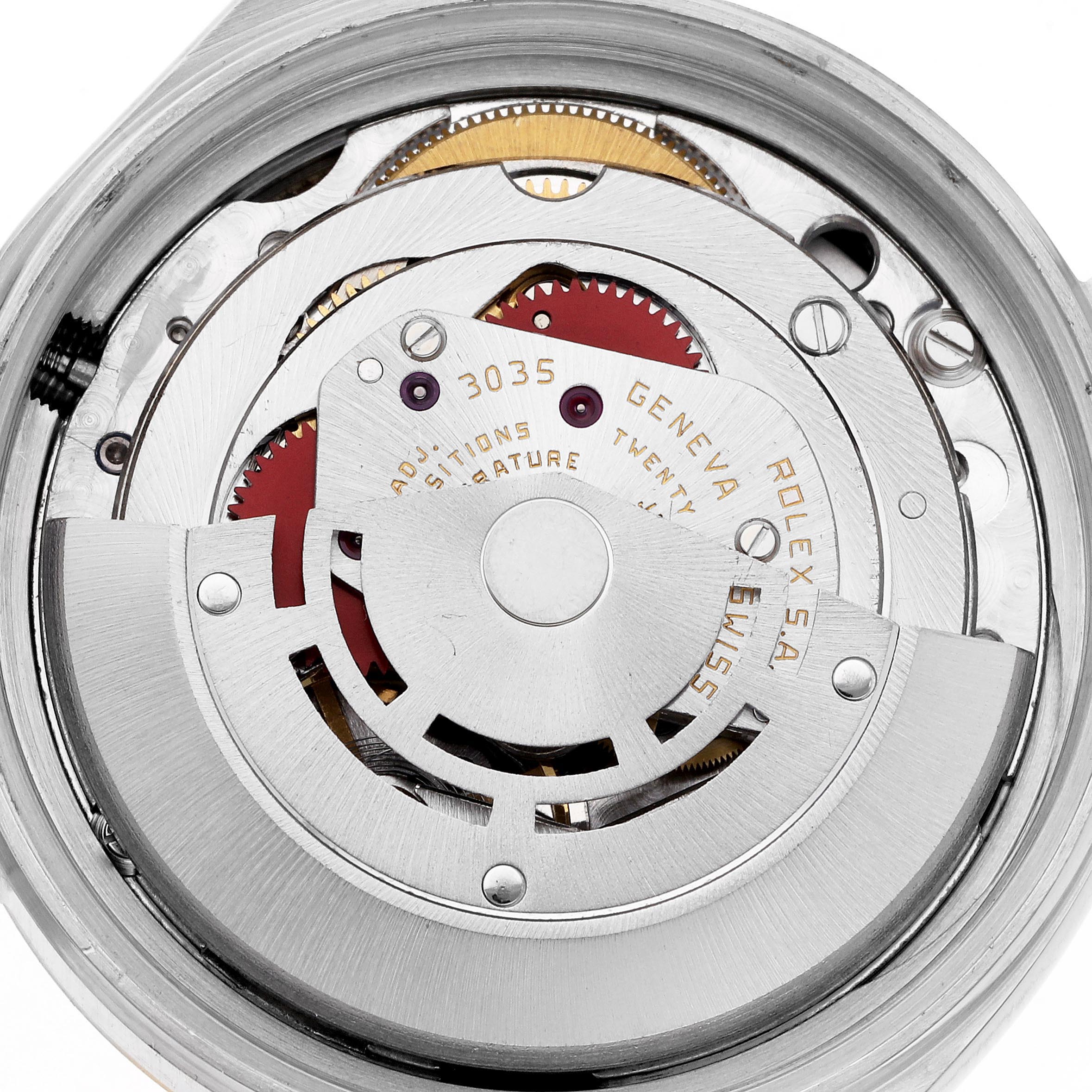 The image shows a close-up of the movement inside a Rolex Datejust 16013 Men's Steel and Gold (two tone) Champagne Dial 16013 Men's Steel and Gold (two tone) Champagne Dial watch, highlighting its intricate mechanical parts.