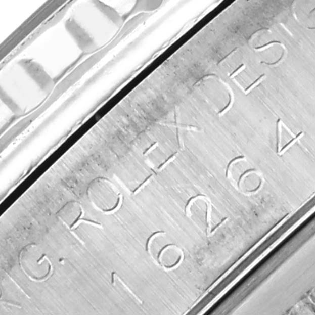 The image shows a close-up of the Rolex Turn-o-Graph 16264 Men
s Stainless Steel Silver Dial 16264 Men
s Stainless Steel Silver Dial
s side, highlighting the engraved model number and design details.