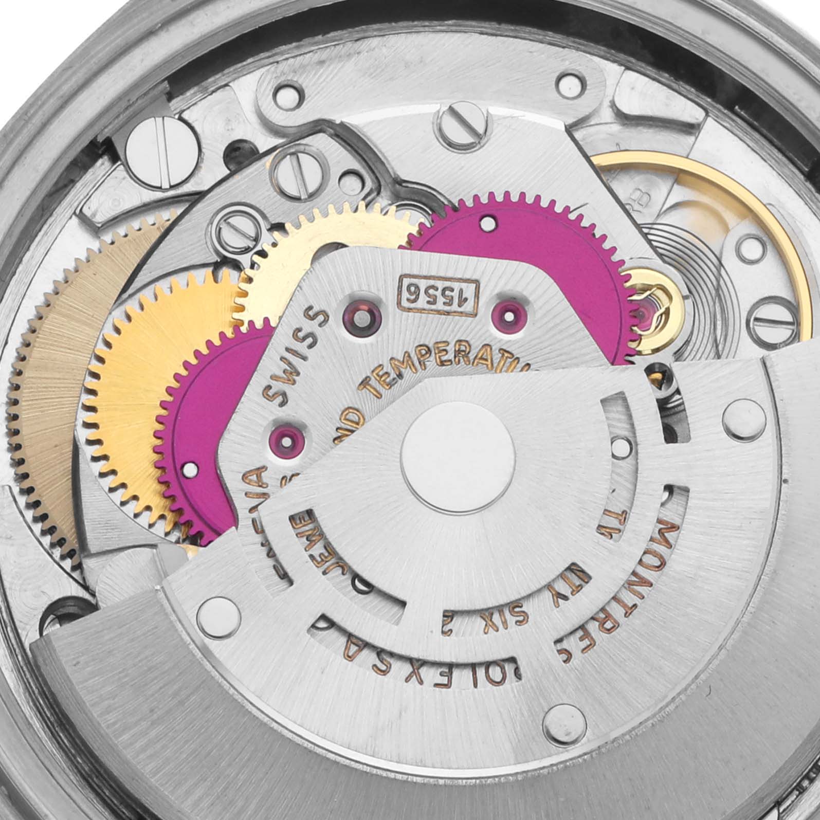 This image shows a close-up view of the movement mechanism inside a Rolex President 1803 Men's White Gold Silver Dial 1803 Men's White Gold Silver Dial model watch, highlighting gears and plates.