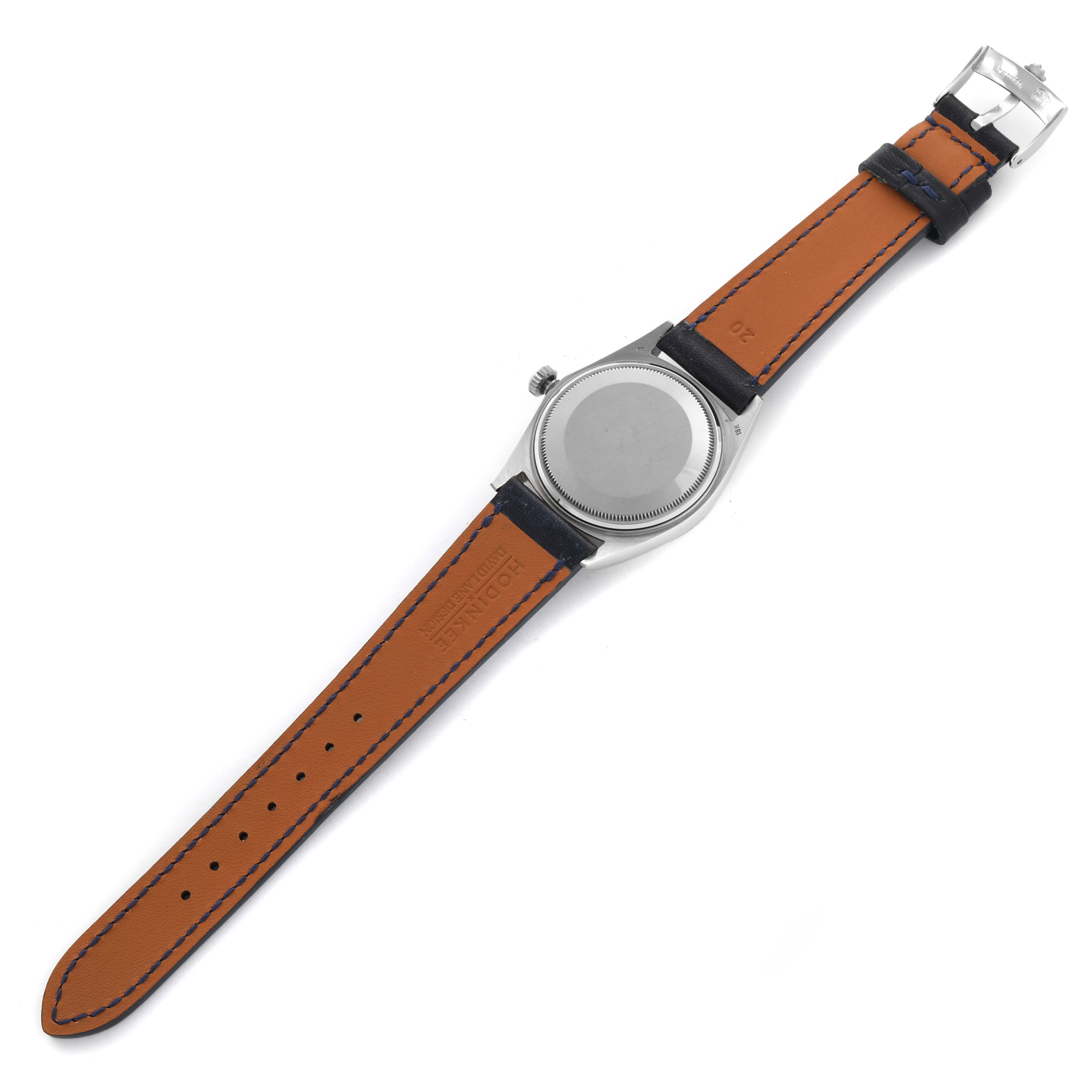 The image shows the back of the Rolex President 1803 Men's White Gold Silver Dial 1803 Men's White Gold Silver Dial watch, focusing on the case back, leather strap, and buckle.