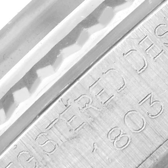 The close-up image shows part of the inner clasp of a Rolex President 1803 Men's White Gold Silver Dial 1803 Men's White Gold Silver Dial model, featuring engraved text and detailing.