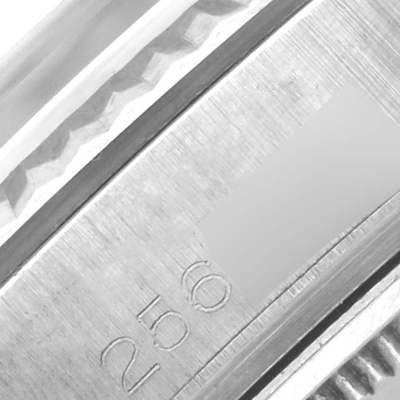 The image shows a close-up of the engraved inner bezel of a Rolex President 1803 Men's White Gold Silver Dial 1803 Men's White Gold Silver Dial model watch.