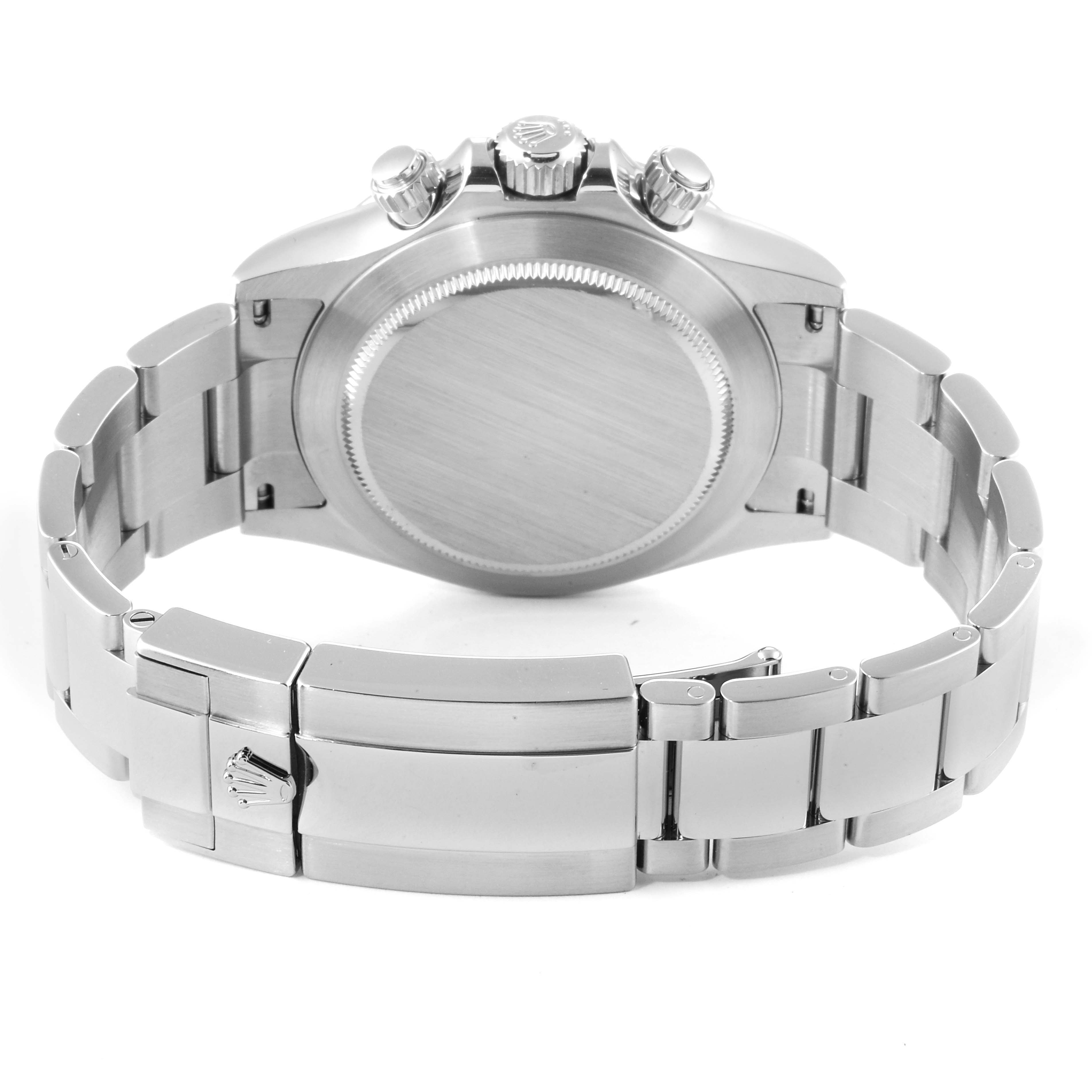 The image shows the back view of the Rolex Daytona 116520 Men's Stainless Steel Black Dial 116520 Men's Stainless Steel Black Dial watch highlighting its case and stainless steel bracelet with the clasp.