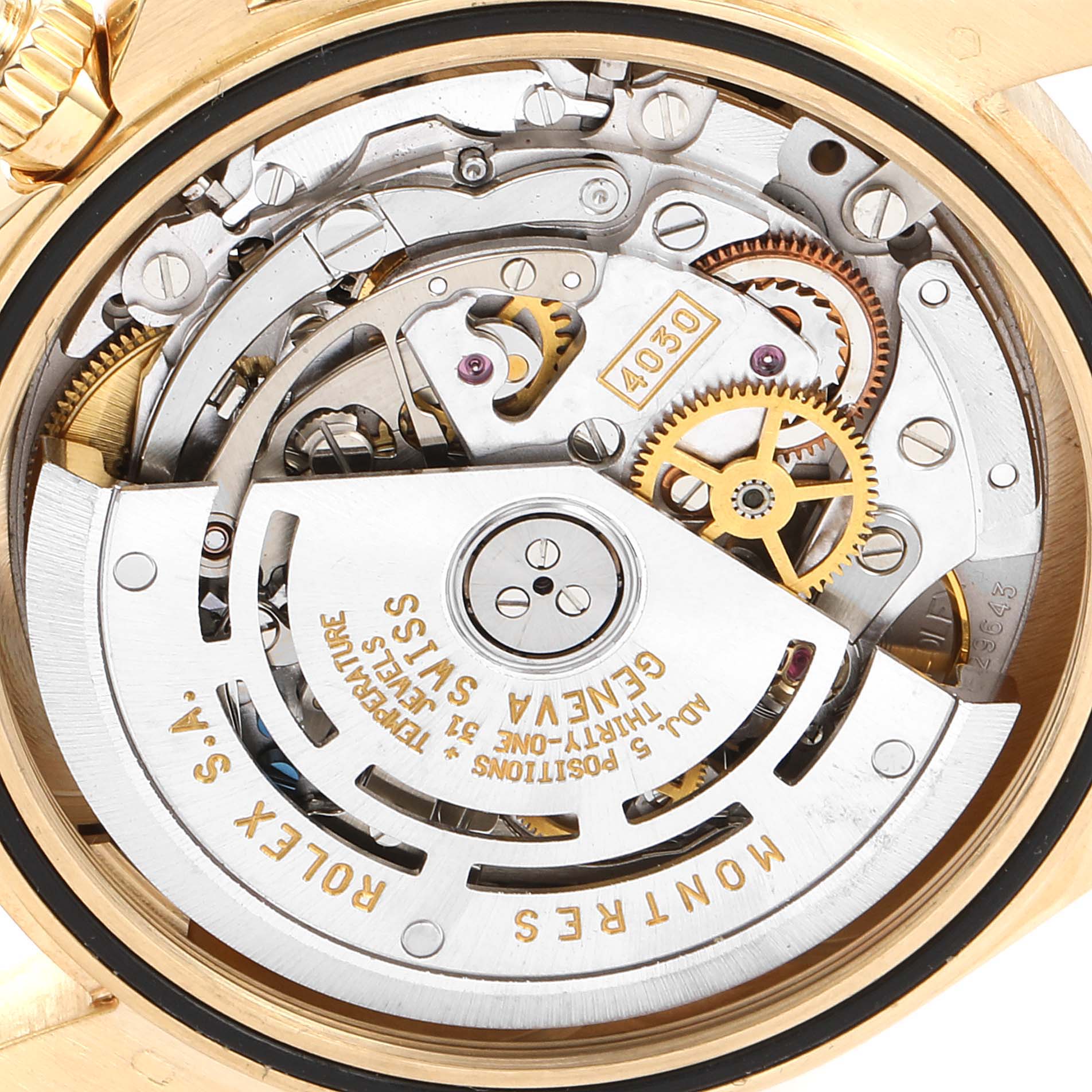 This is a close-up view of the movement mechanism inside a Rolex Daytona 16568 Men's Yellow Gold Black Dial 16568 Men's Yellow Gold Black Dial watch.