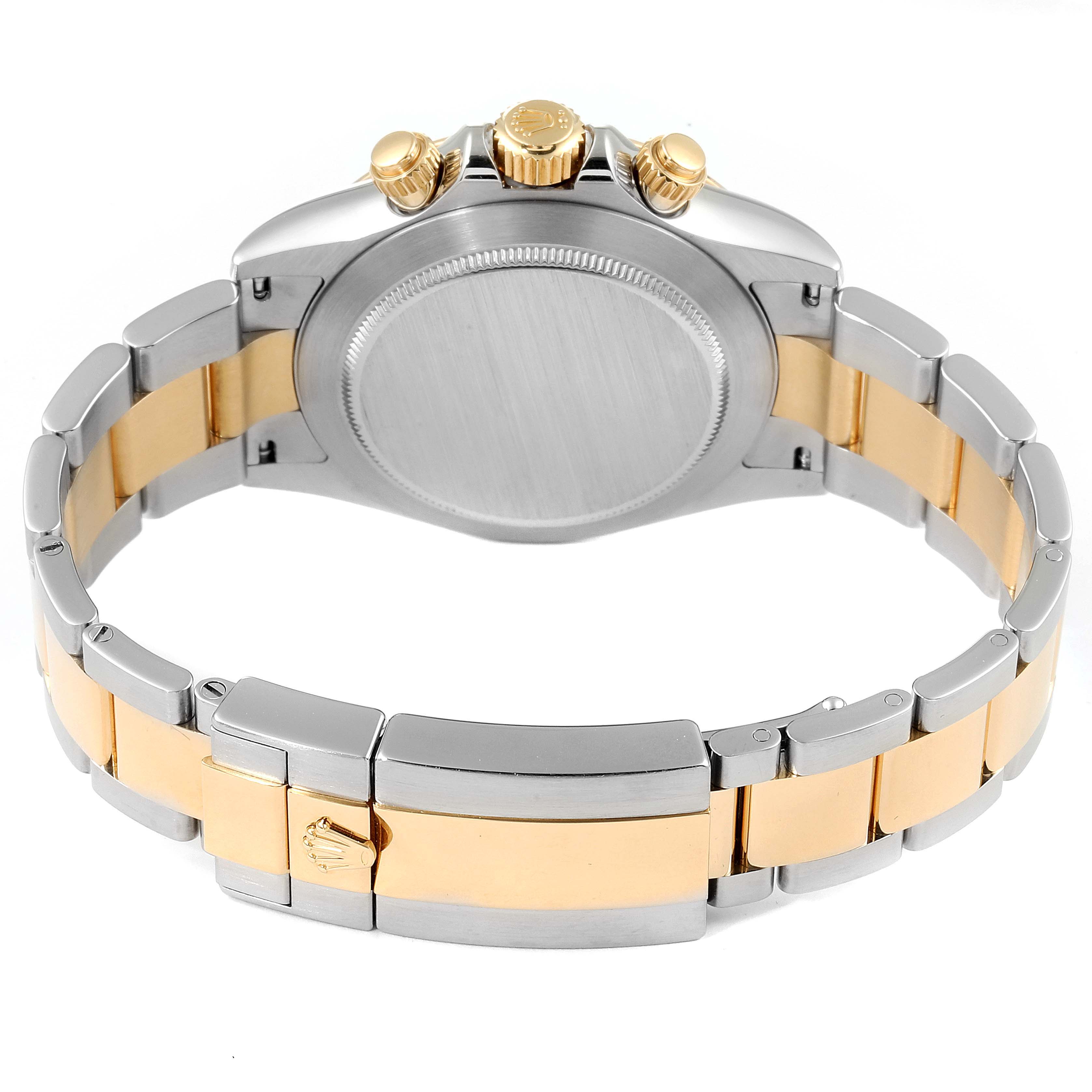 The image shows the back and bracelet of a Rolex Daytona 116523 Men's Steel and Gold (two tone) Mother of Pearl Dial 116523 Men's Steel and Gold (two tone) Mother of Pearl Dial watch with a two-tone metal design.