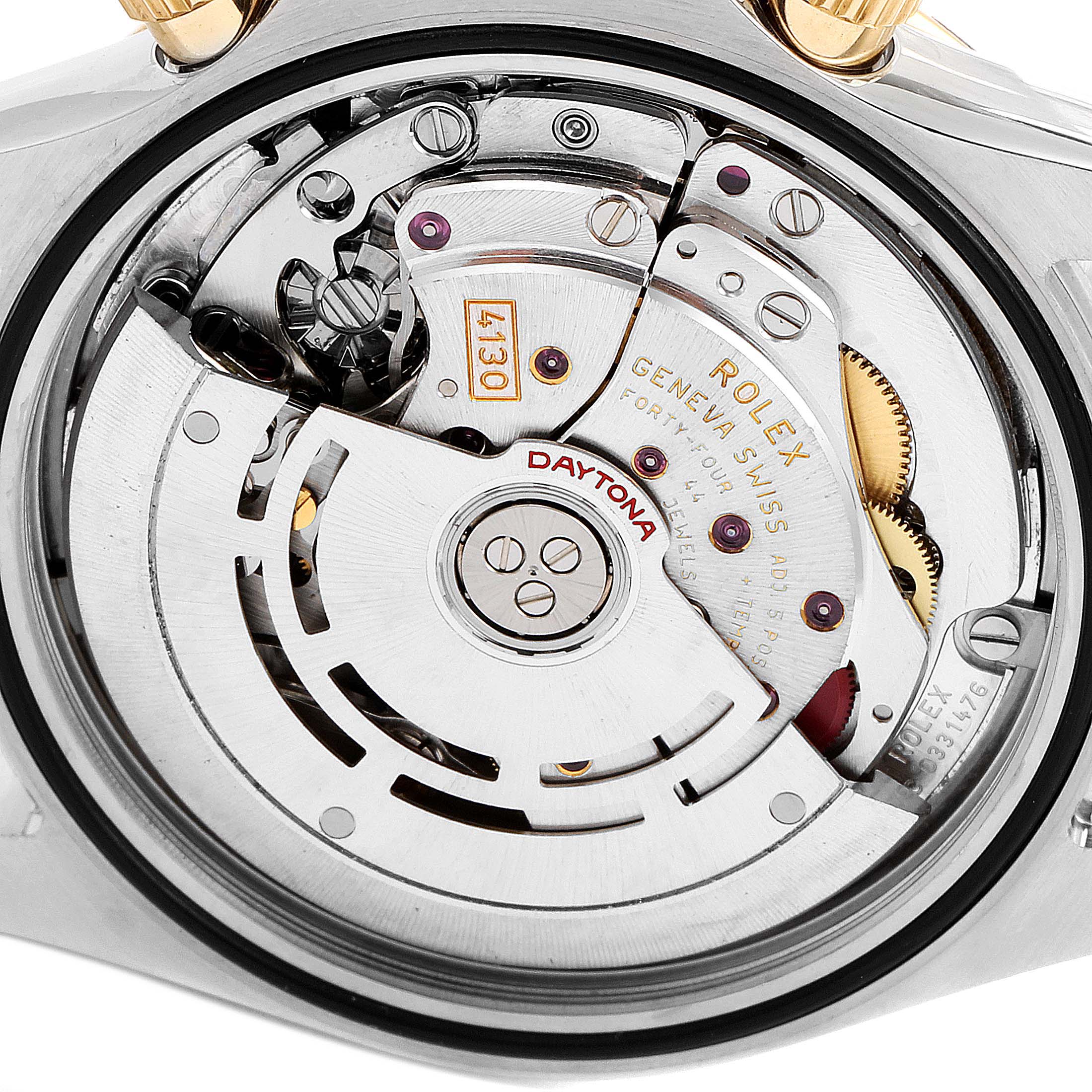 This image shows the inner movement and mechanical components of a Rolex Daytona 116523 Men's Steel and Gold (two tone) Mother of Pearl Dial 116523 Men's Steel and Gold (two tone) Mother of Pearl Dial watch.