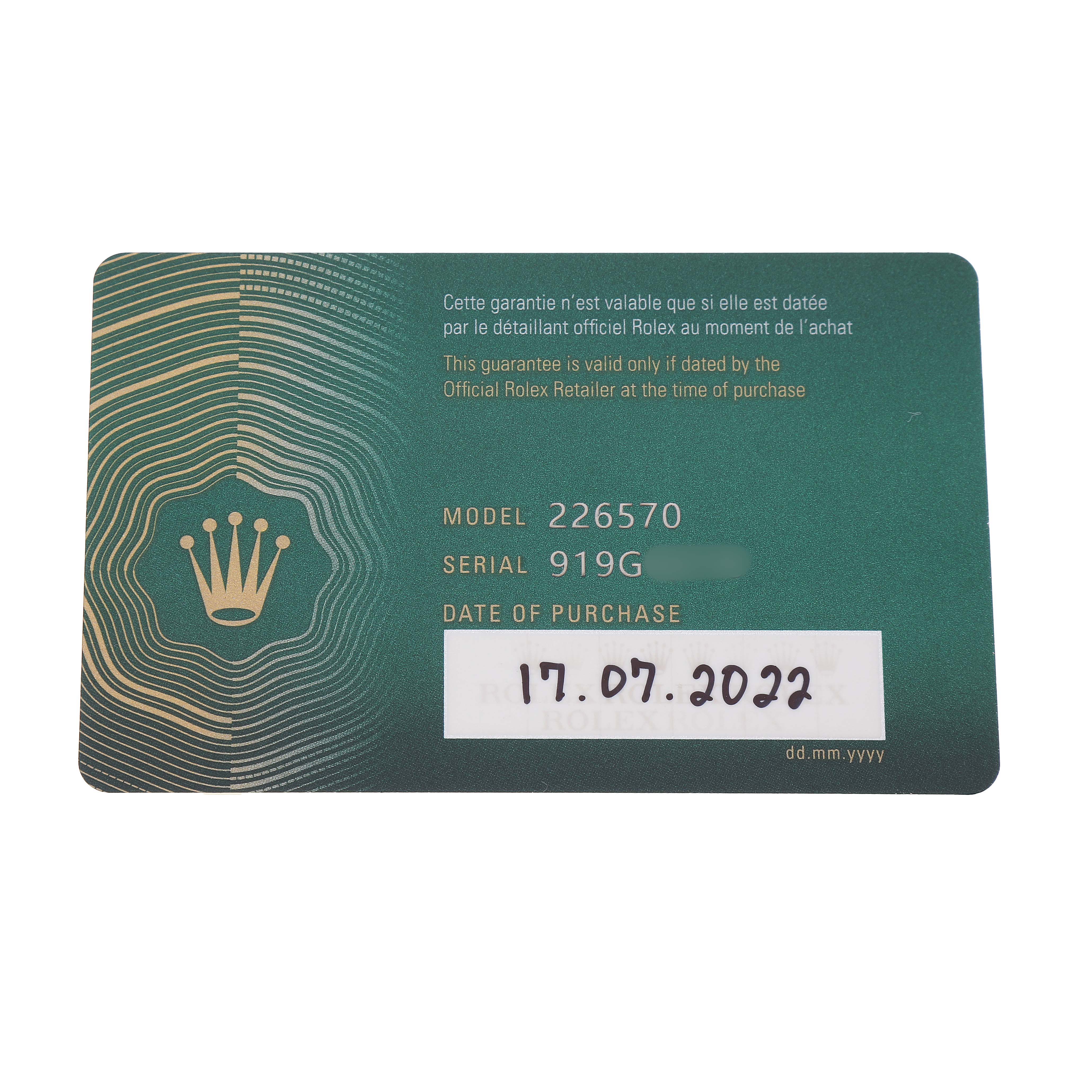 The image shows a warranty card for the Rolex Explorer 226570 Men's Stainless Steel Black Dial model, angled to display model and serial numbers.