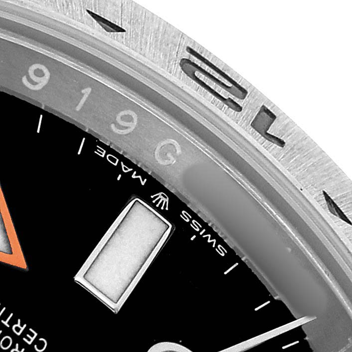 The image shows a close-up of the dial and bezel of a Rolex Explorer 226570 Men's Stainless Steel Black Dial watch.