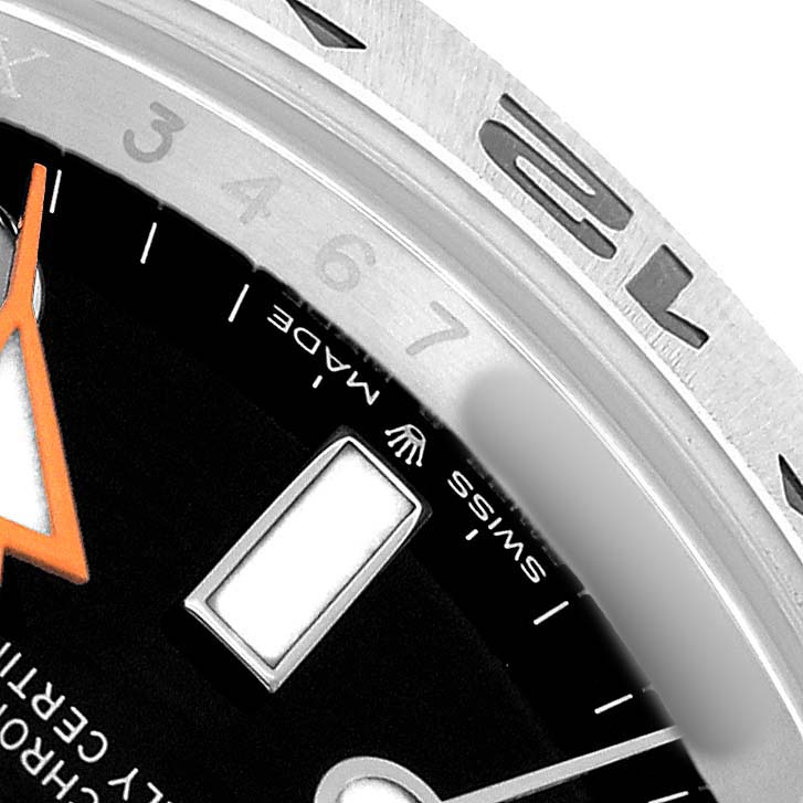 The image shows a close-up of the Rolex Explorer M226570-002 Men's Stainless Steel Black Dial watch's face, focusing on the dial, indices, and part of the bezel.