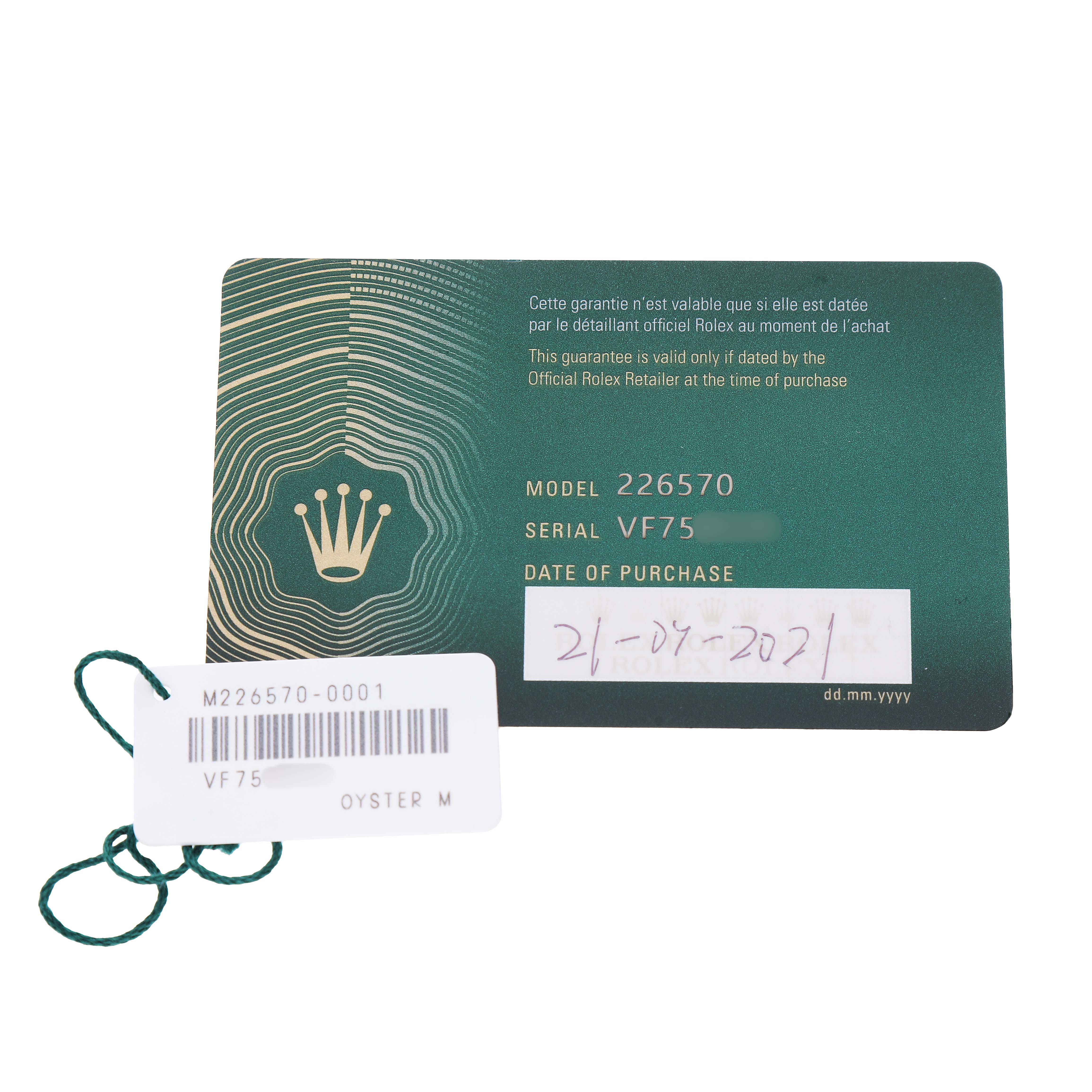 The image shows the warranty card and tag for a Rolex Explorer M226570-001 Men's Stainless Steel White Dial model 226570, viewed from above.