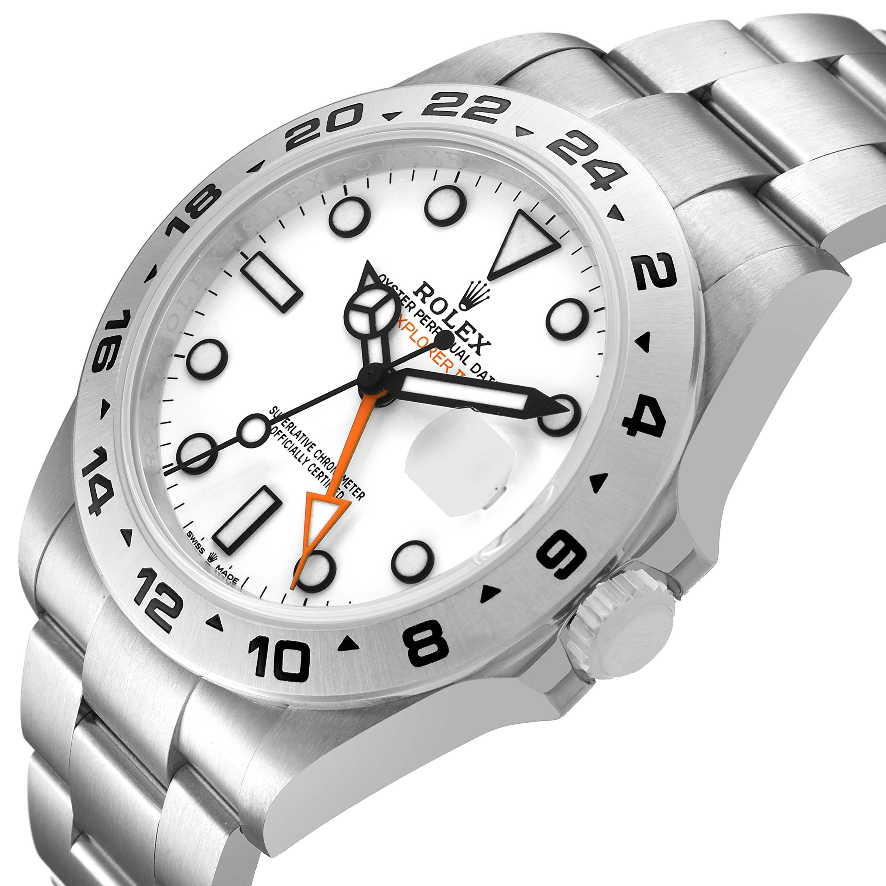 The Rolex Explorer M226570-001 Men's Stainless Steel White Dial watch is shown at a slight angle, displaying its face, bezel, crown, and part of the bracelet.