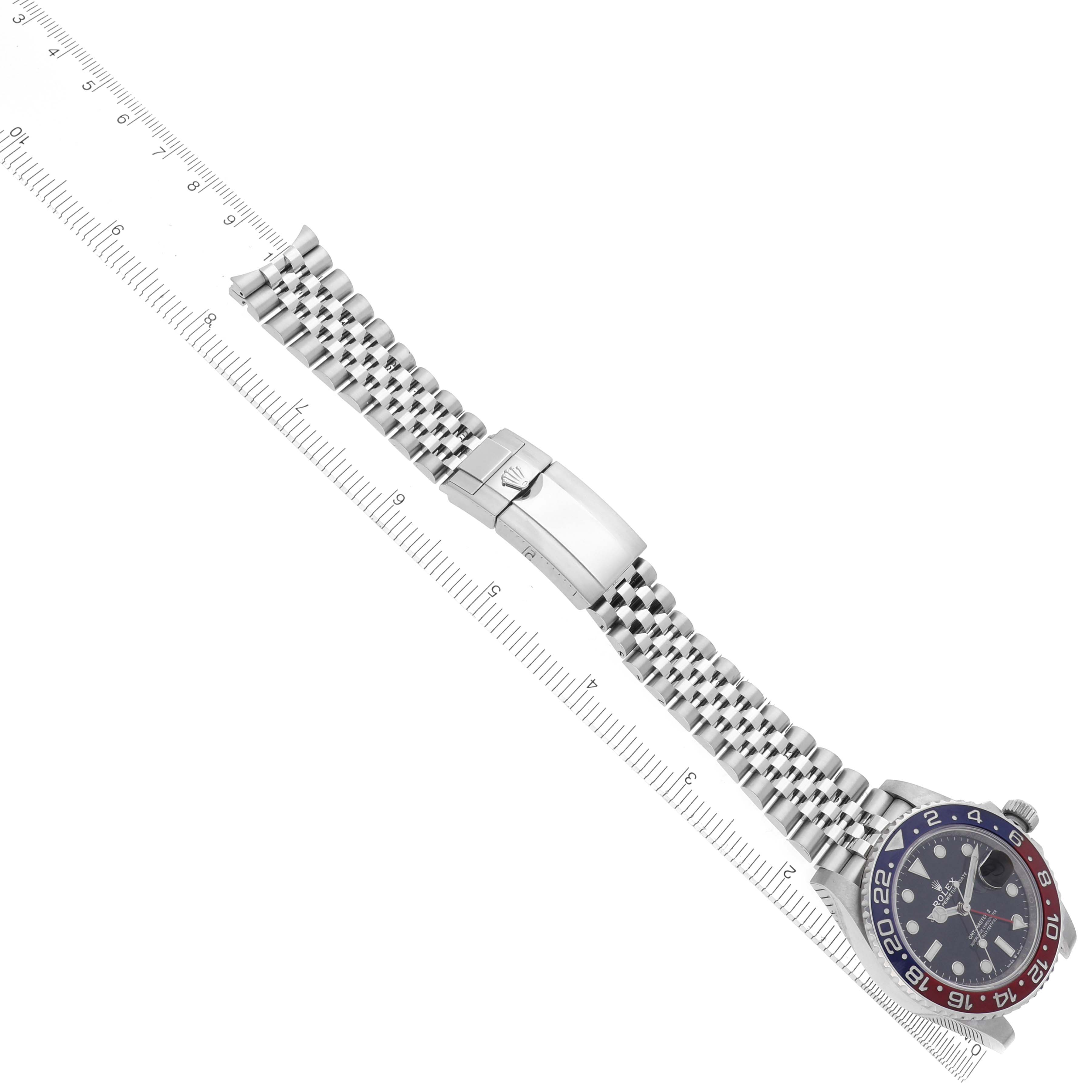 The image shows the Rolex GMT-Master 126710BLRO Men's Stainless Steel Black Dial 126710BLRO Men's Stainless Steel Black Dial watch from a top-down view, displaying the face, bezel, bracelet, and clasp.