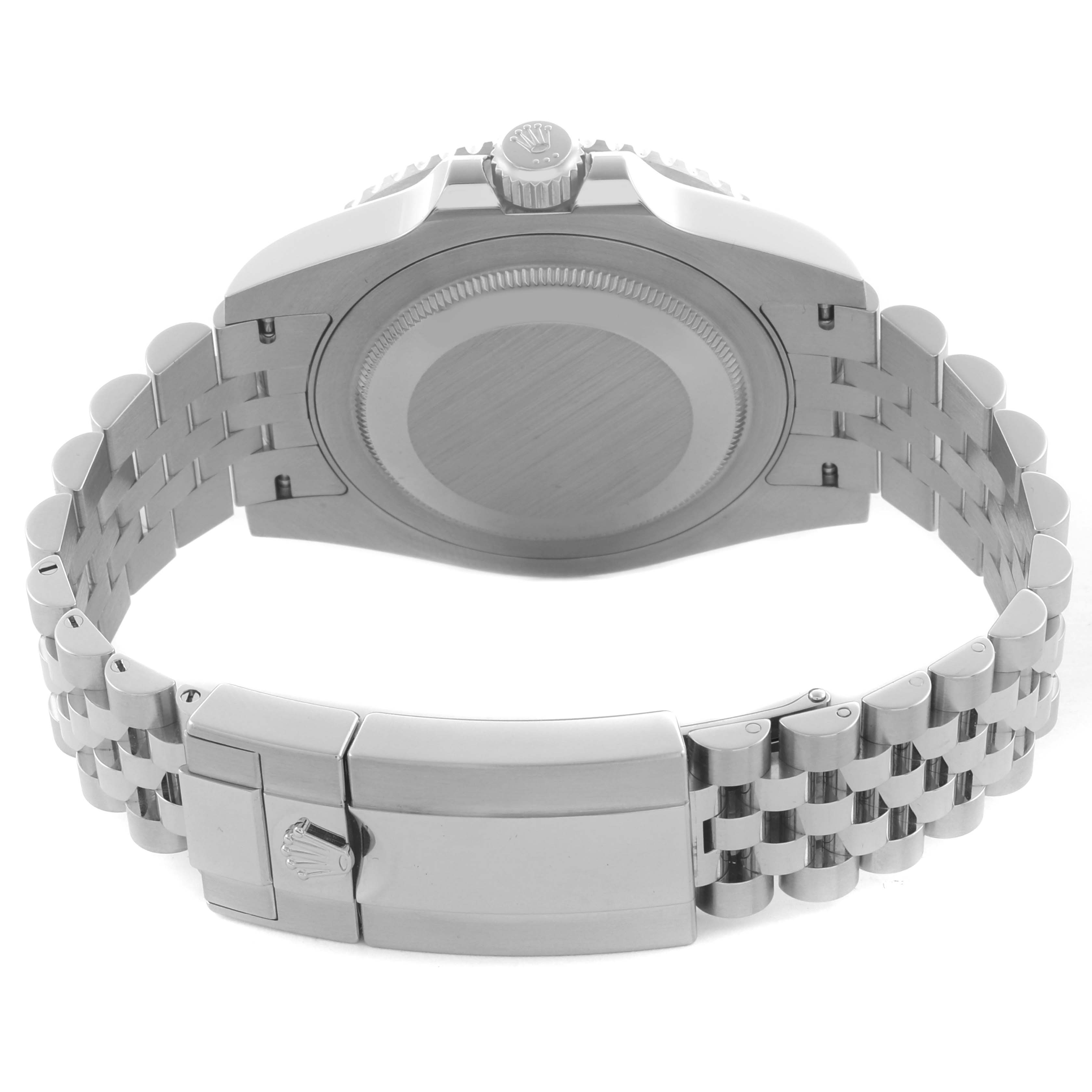 The Rolex GMT-Master 126710BLRO Men's Stainless Steel Black Dial 126710BLRO Men's Stainless Steel Black Dial watch is shown from the back, highlighting the case back, crown, and bracelet clasp.