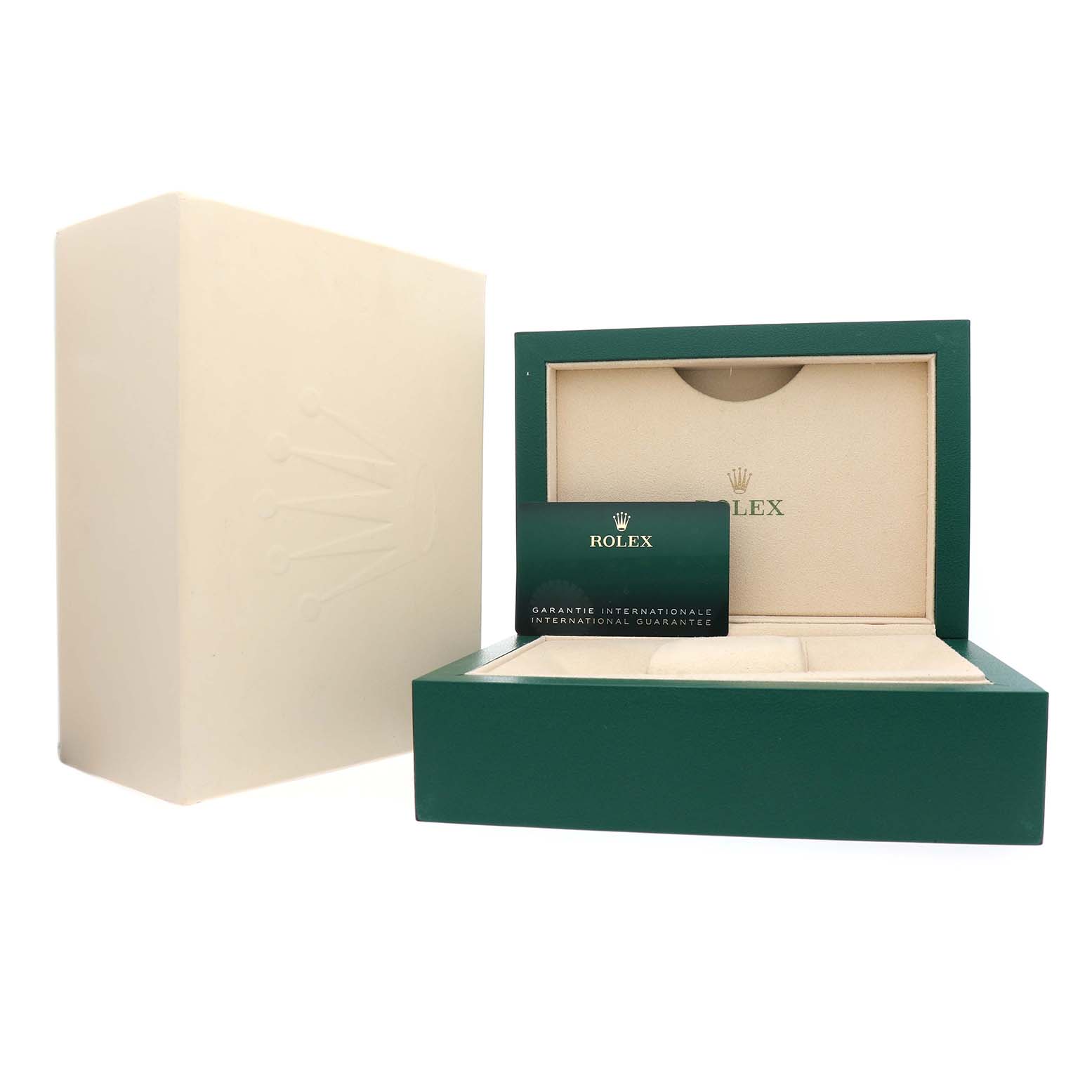 The image shows the packaging and guarantee card for the Rolex GMT-Master 126710BLNR Men's Stainless Steel Black Dial, with the box open to display the interior.