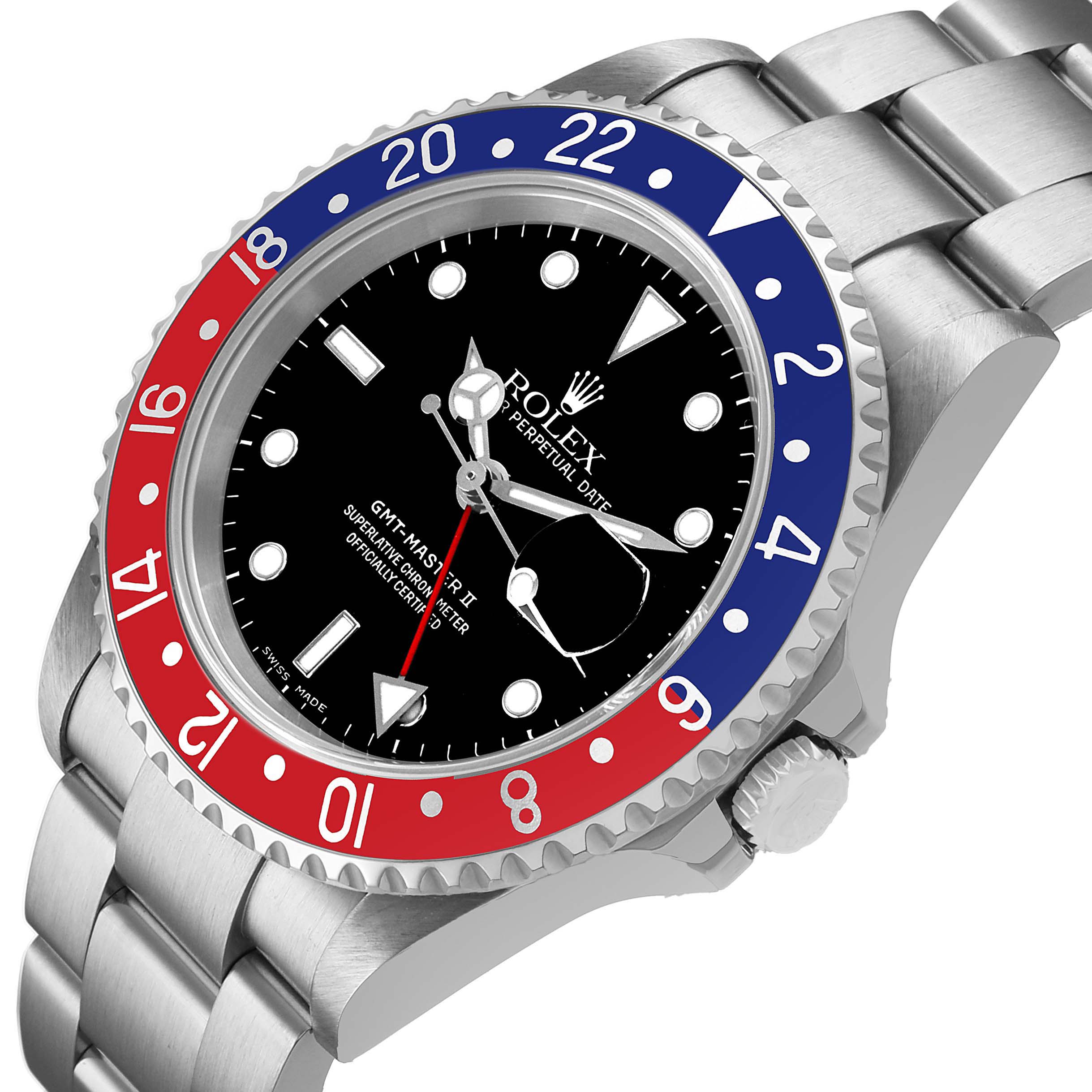 The image shows a Rolex GMT-Master 16710 Men's Stainless Steel Black Dial II watch from a slightly angled top view, highlighting the dial, bezel, and part of the bracelet.