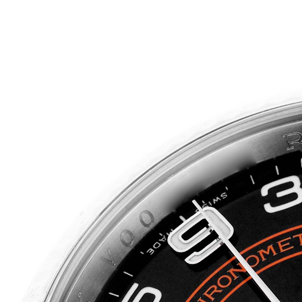 The image shows a close-up of the dial on the Rolex Oyster Perpetual 116034 Men's Stainless Steel Black Dial, highlighting the numerals and hands.