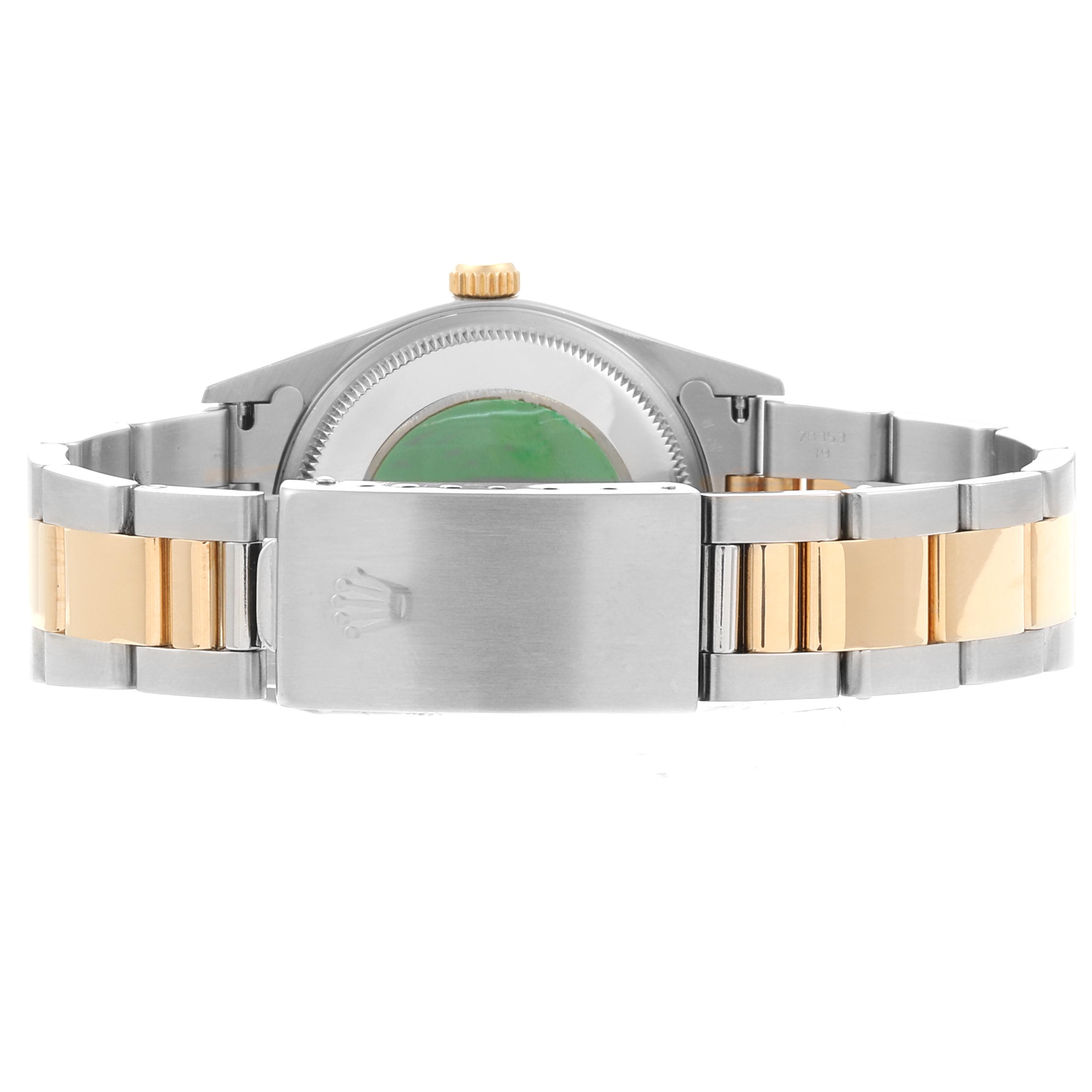 This image shows the back view of a Rolex Oyster Perpetual 14203 Men's Steel and Gold (two tone) Grey Dial 14203 Men's Steel and Gold (two tone) Grey Dial watch, highlighting the bracelet and clasp.