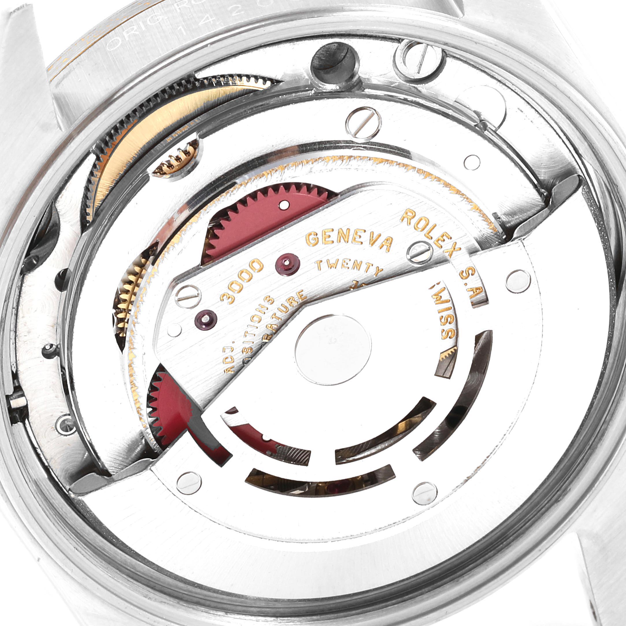 The image shows the internal movement mechanism of a Rolex Oyster Perpetual 14203 Men's Steel and Gold (two tone) Grey Dial 14203 Men's Steel and Gold (two tone) Grey Dial watch.