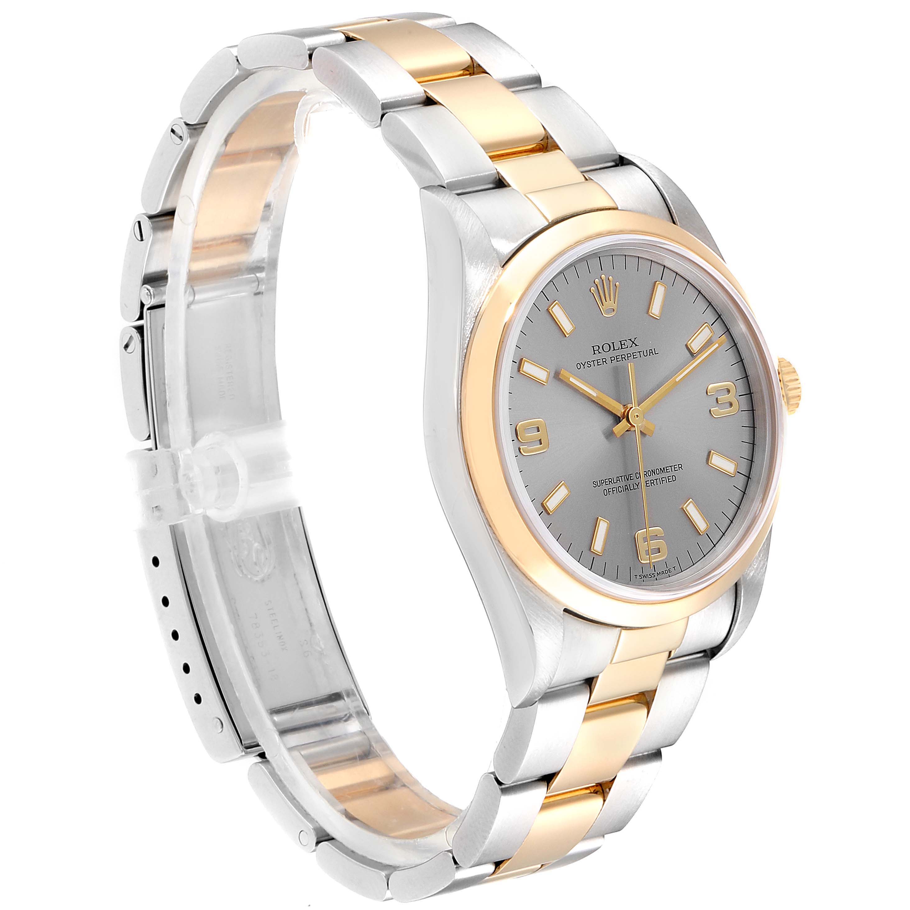 The image shows a Rolex Oyster Perpetual 14203 Men's Steel and Gold (two tone) Grey Dial 14203 Men's Steel and Gold (two tone) Grey Dial watch from a front-left angle, displaying its two-tone bracelet and face.