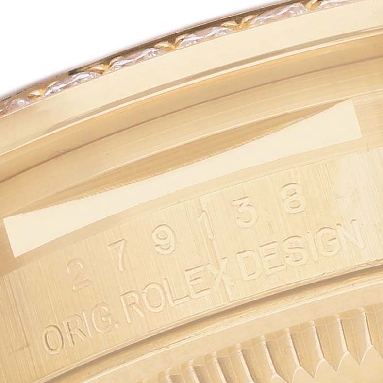 The image shows a close-up of the edge and serial engraving of a Rolex President 279138 Women's Yellow Gold Champagne Dial model, highlighting "Orig. Rolex Design."