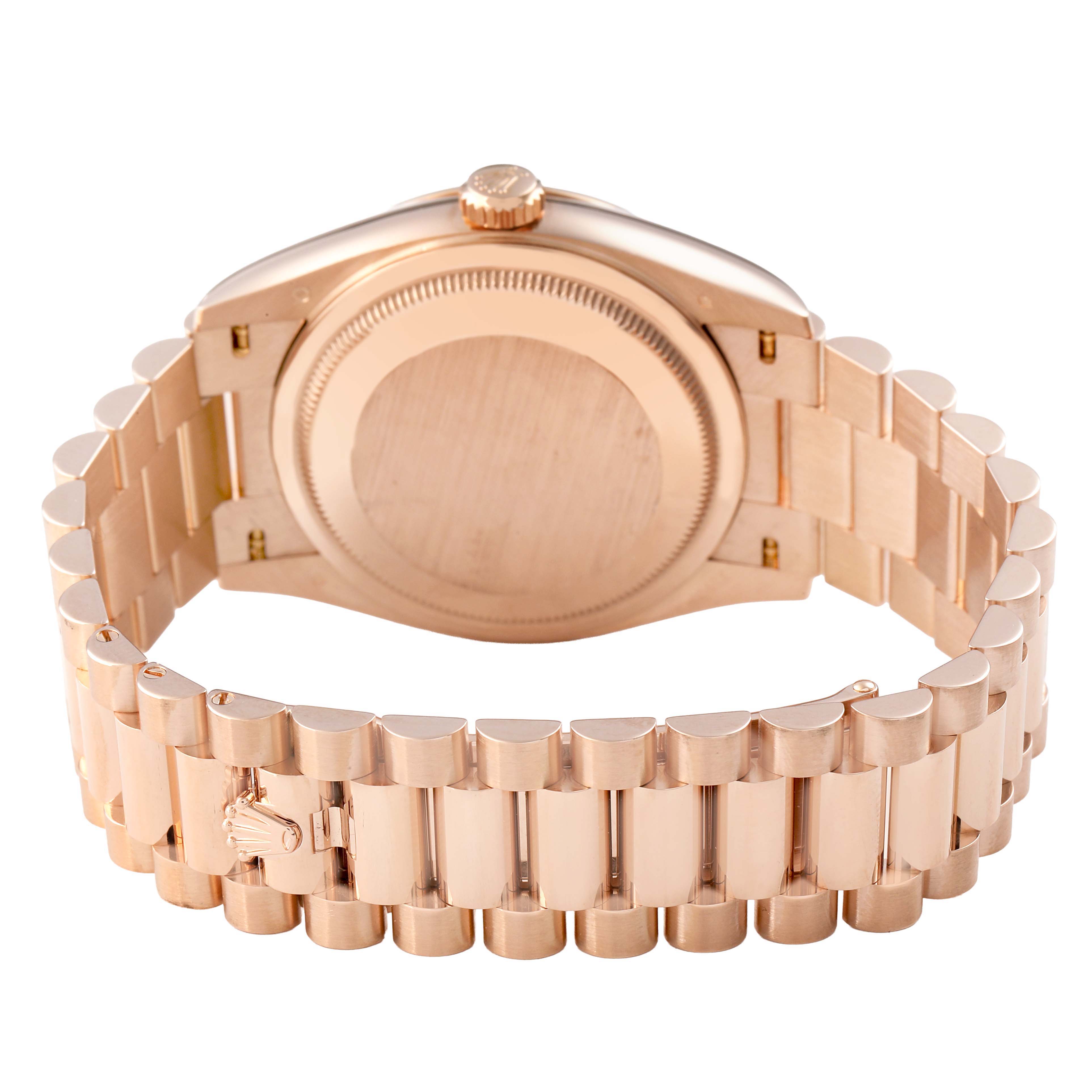 The image shows the back view of a Rolex President 128235 Men's Rose Gold Brown Dial watch, highlighting the case back and bracelet.